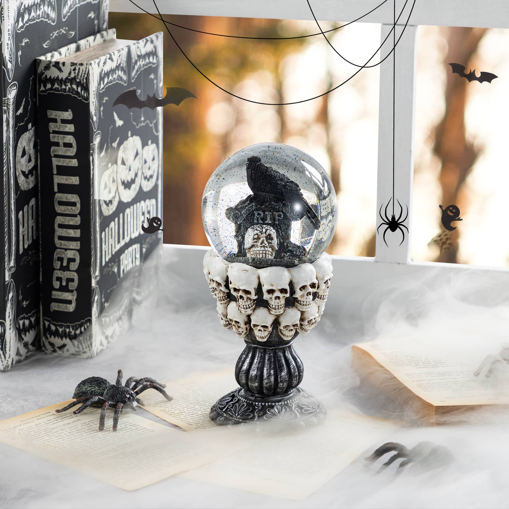 Glitzhome&#xAE; 100mm 7.25&#x22;H Halloween Resin Stacked Skull Waterglobe