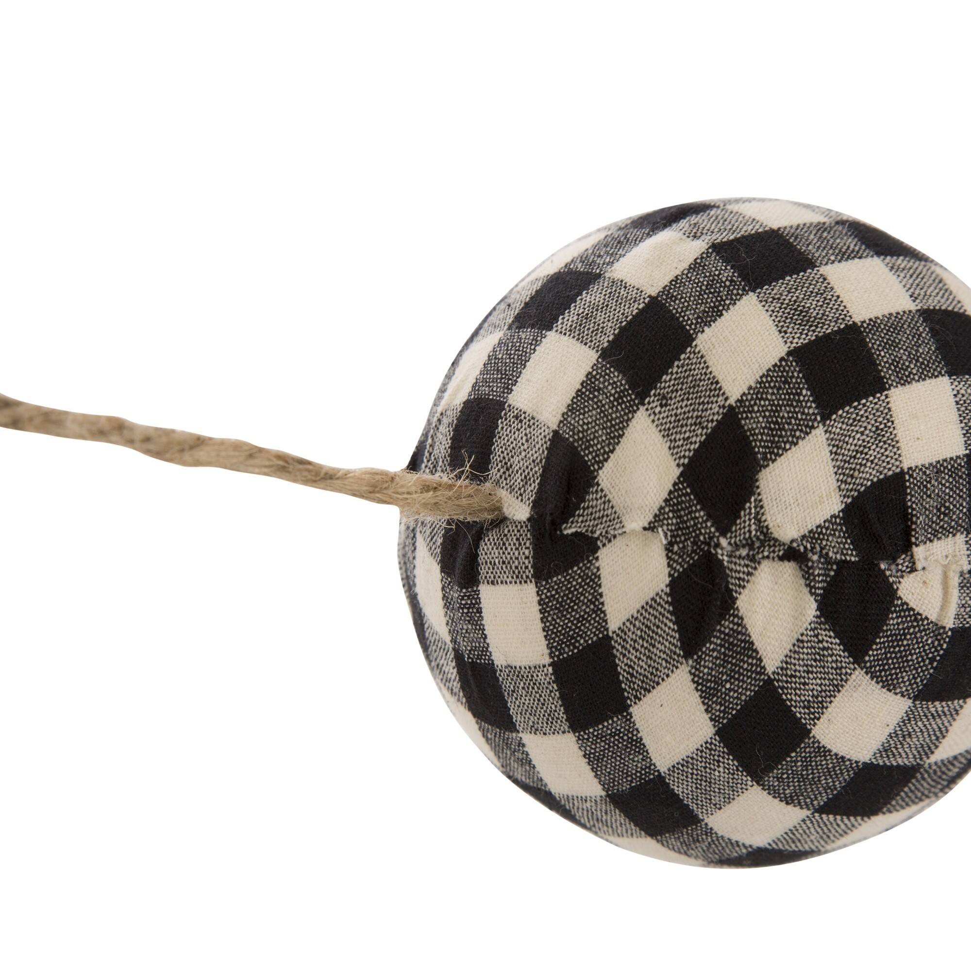 Glitzhome® 6ft. Black & White Plaid Fabric Garland