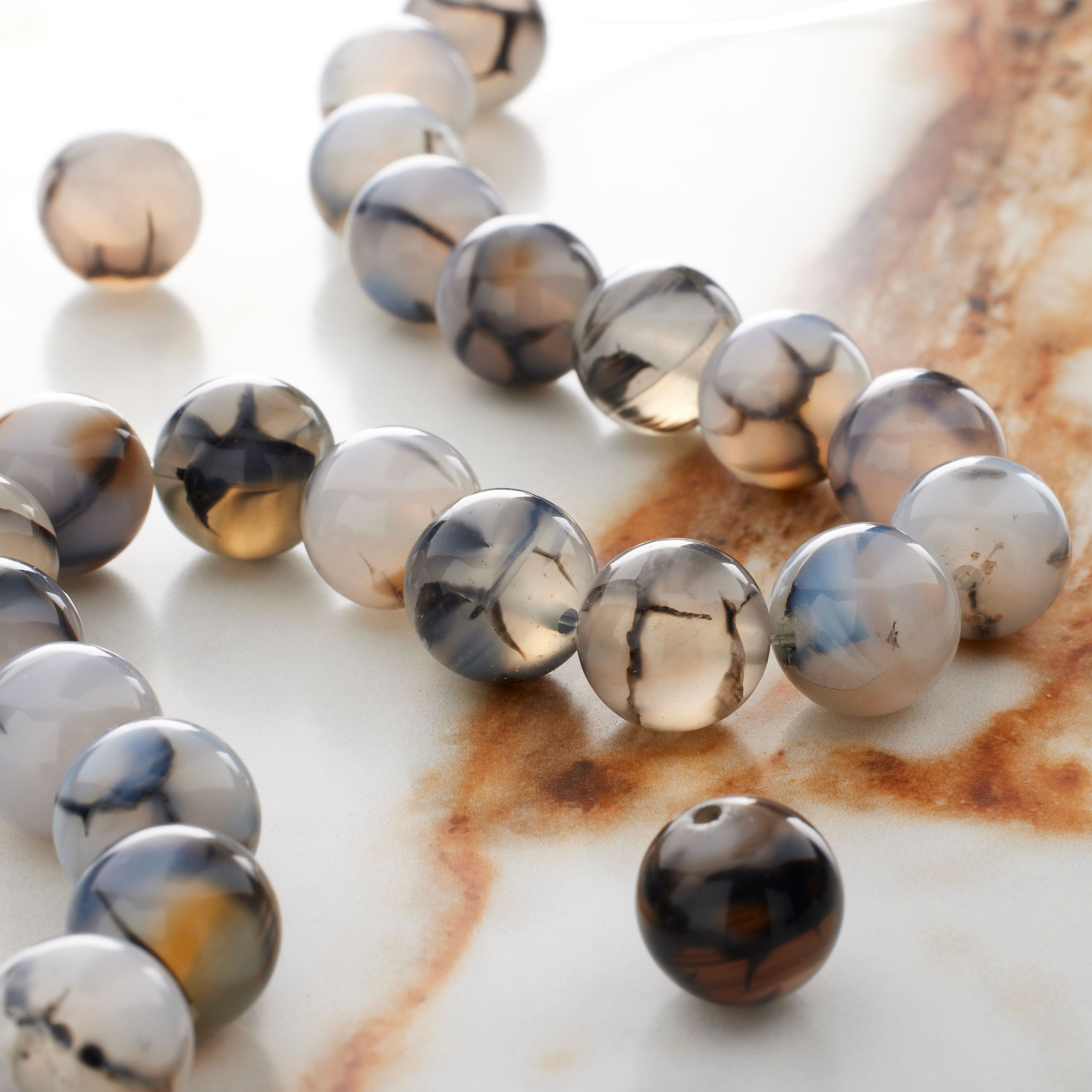 Perles rondes en agate noire rutilée de Bead Landing, 10 mm