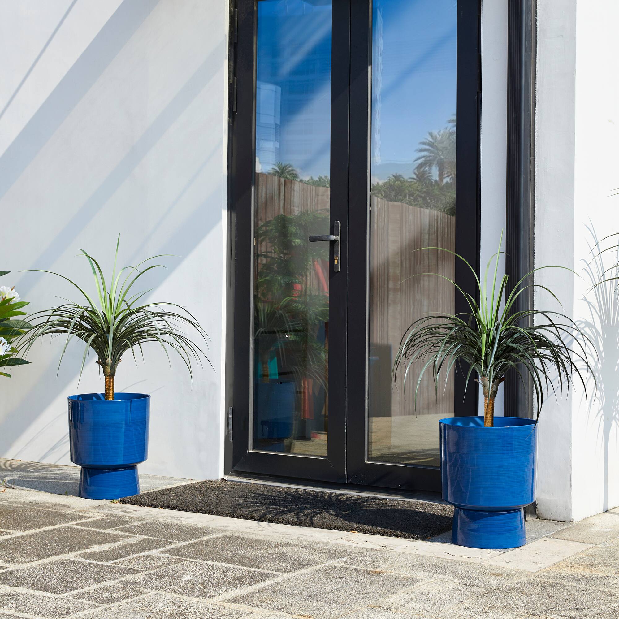 Glitzhome® 16.75" Cobalt Blue Faux Ceramic Urn Plastic Planters, 2ct.