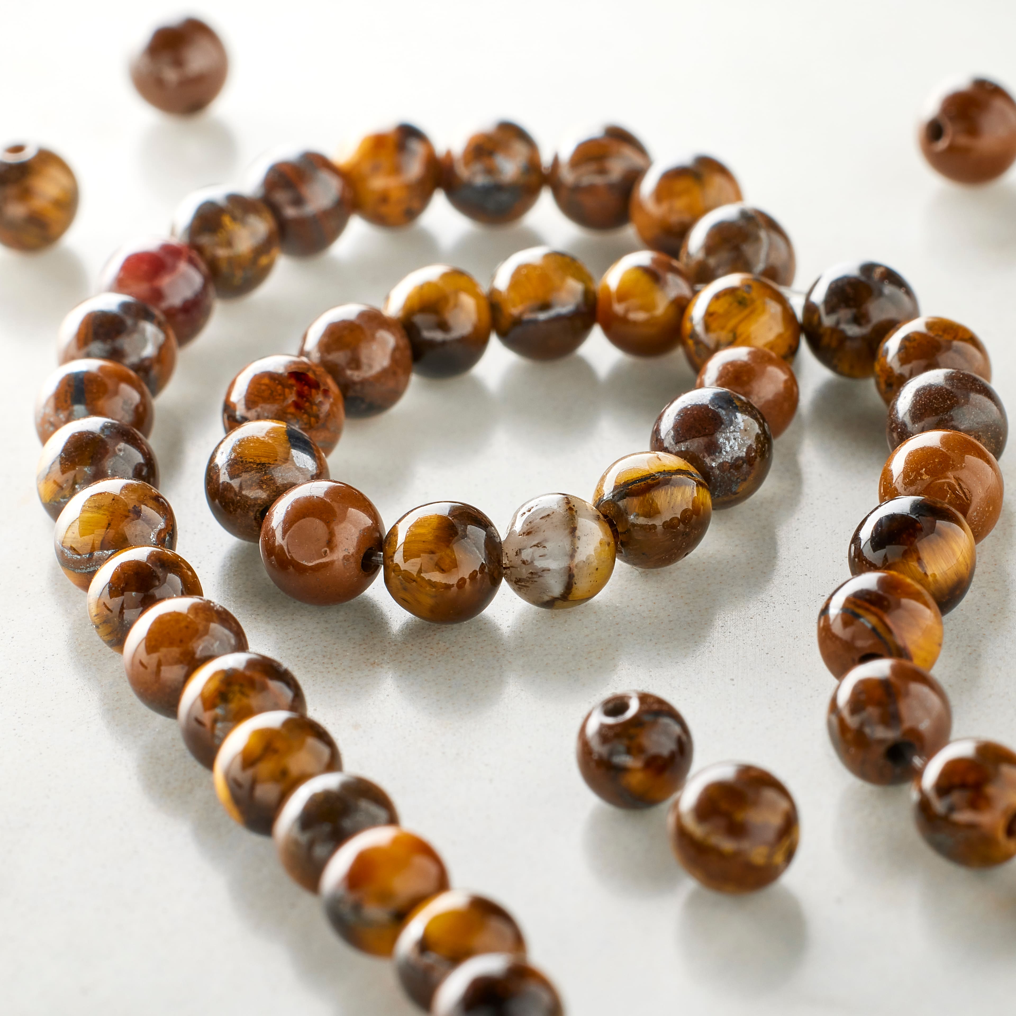 12 Pack: Tiger Eye Round Beads, 4mm by Bead Landing&#x2122;