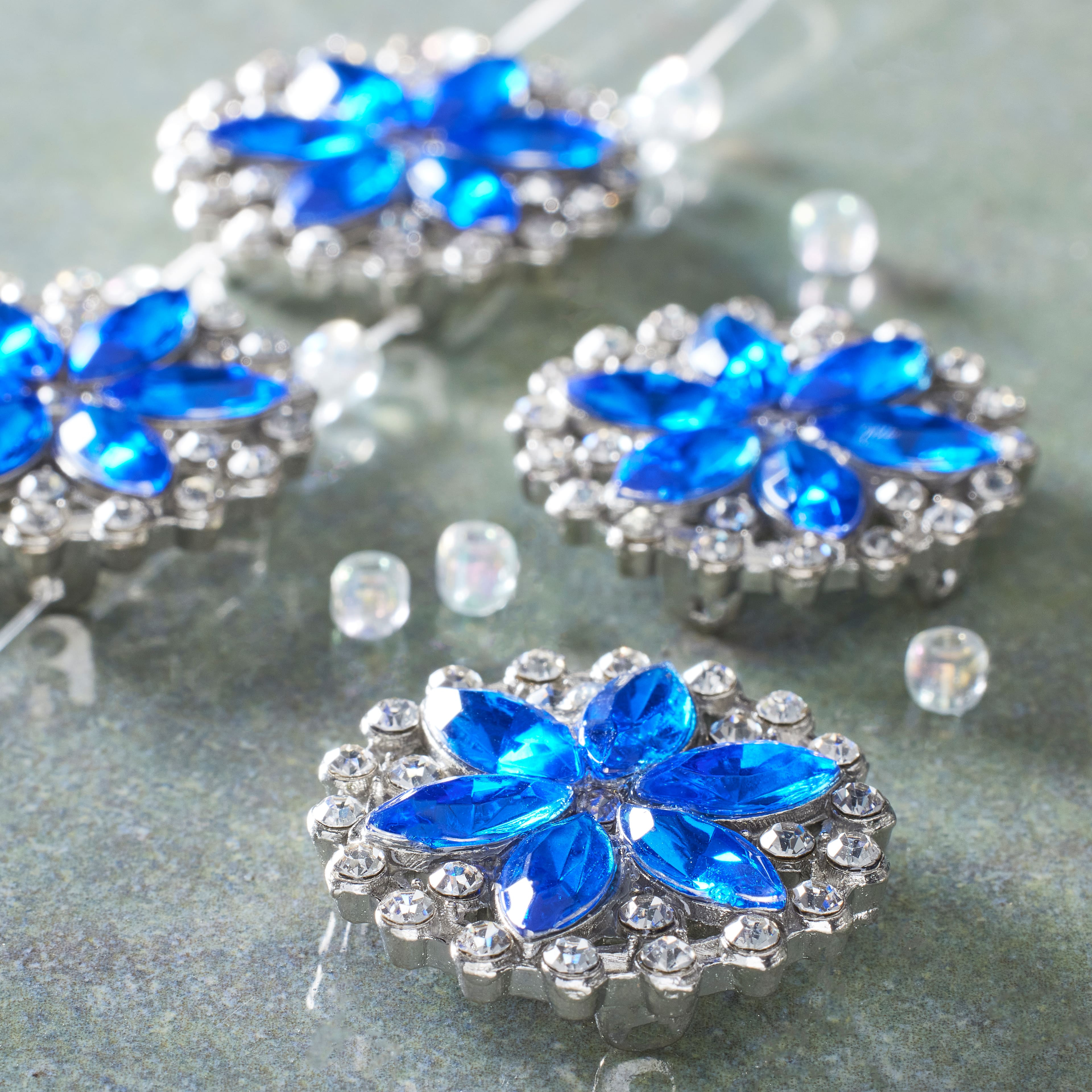 12 Packs: 4 ct. (48 total) Sapphire Metal Flower Sliders, 27mm by Bead Landing™