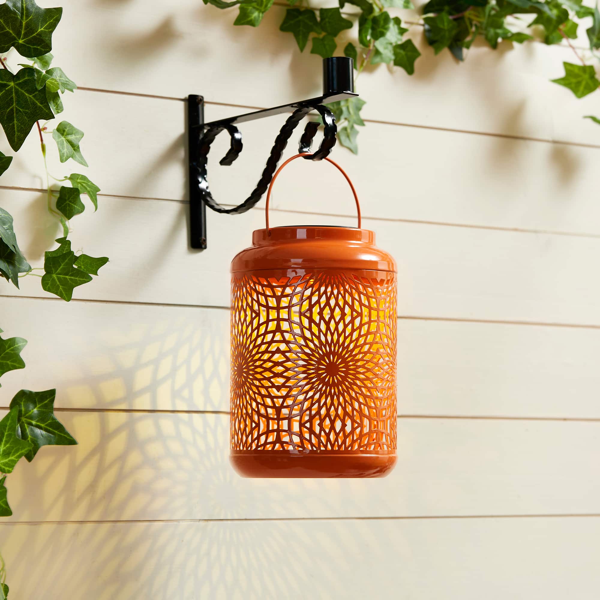 Glitzhome&#xAE; 9&#x22; Cutout Metal Solar Powered Outdoor Hanging Lantern