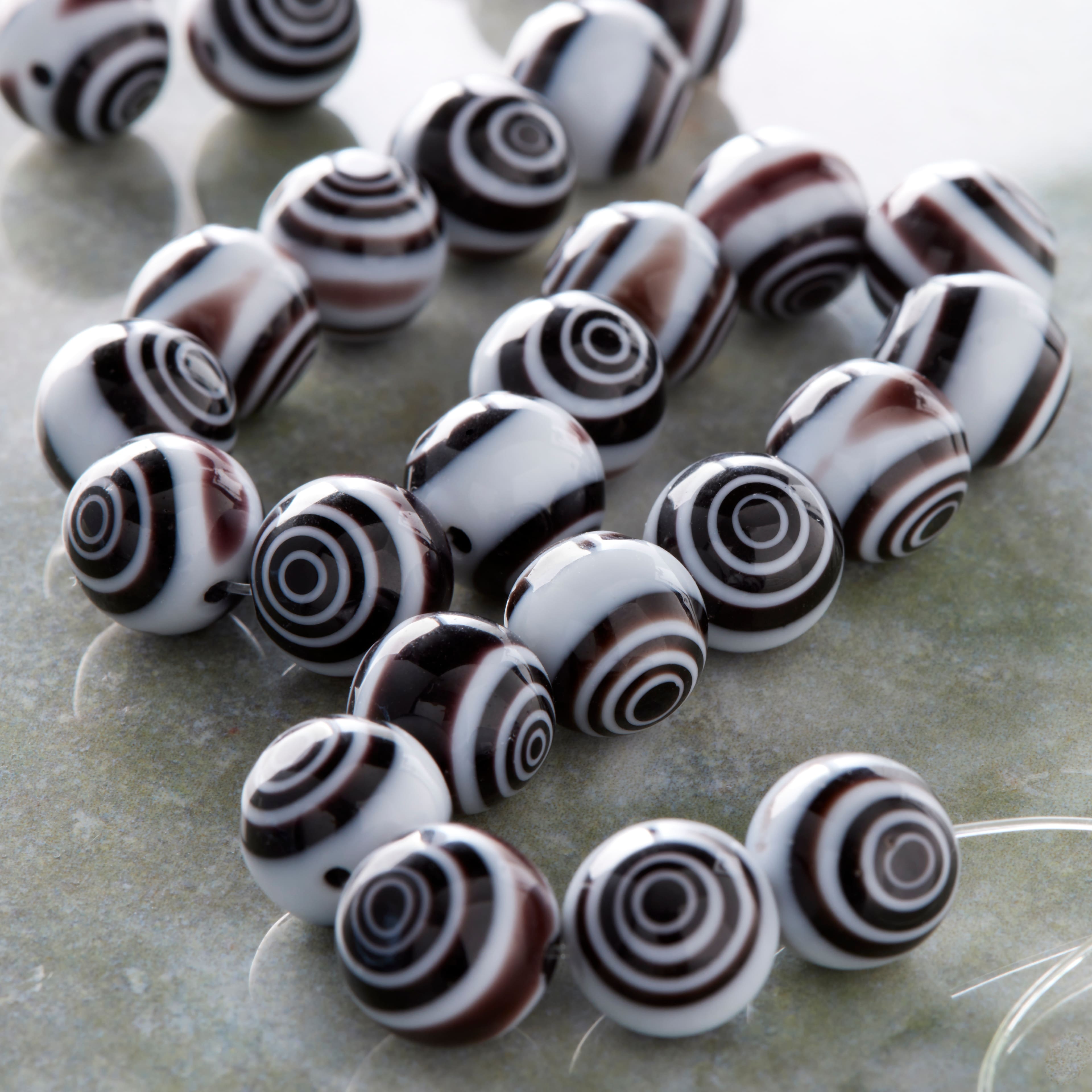 12 Pack: Black &#x26; White Eye-Dot Glass Round Beads, 10mm by Bead Landing&#x2122;
