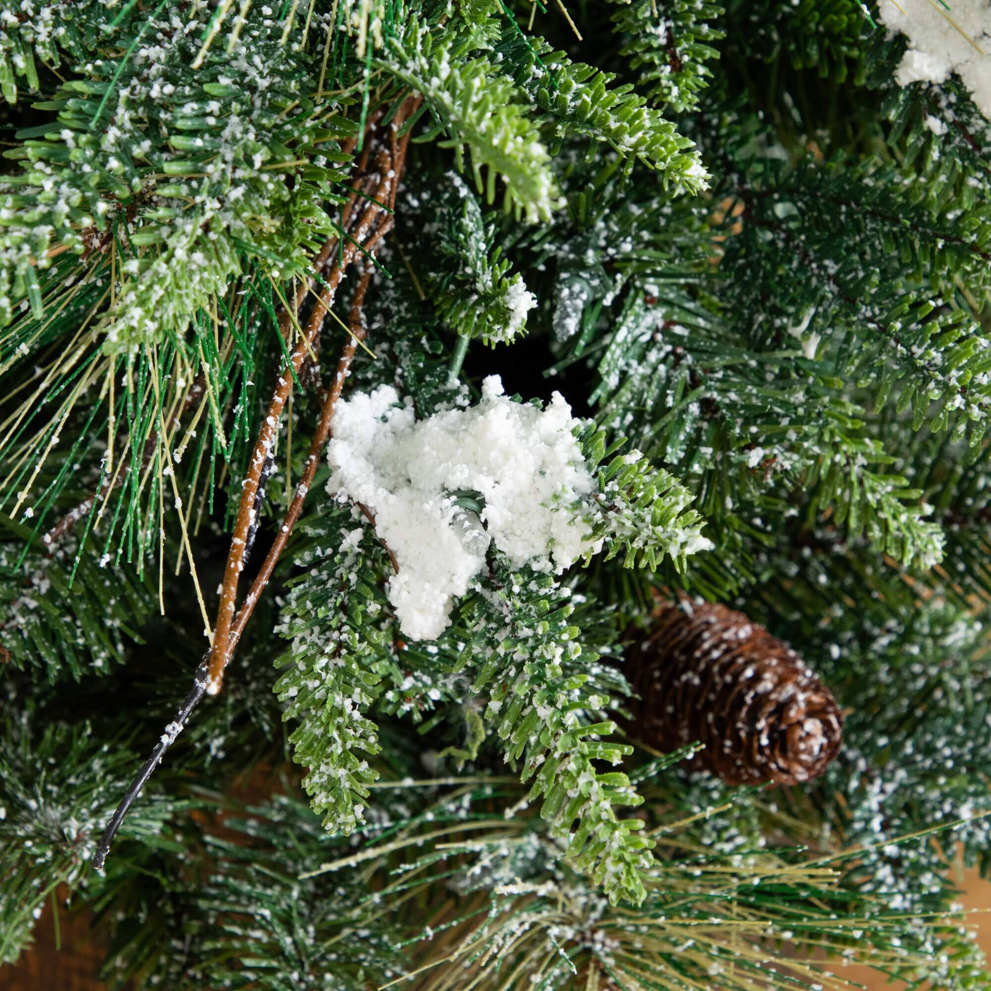 4ft. Pre-Lit Mixed Pine Snowed Artificial Christmas Tree with Pinecones in Decorative Planter, Warm White LED Lights