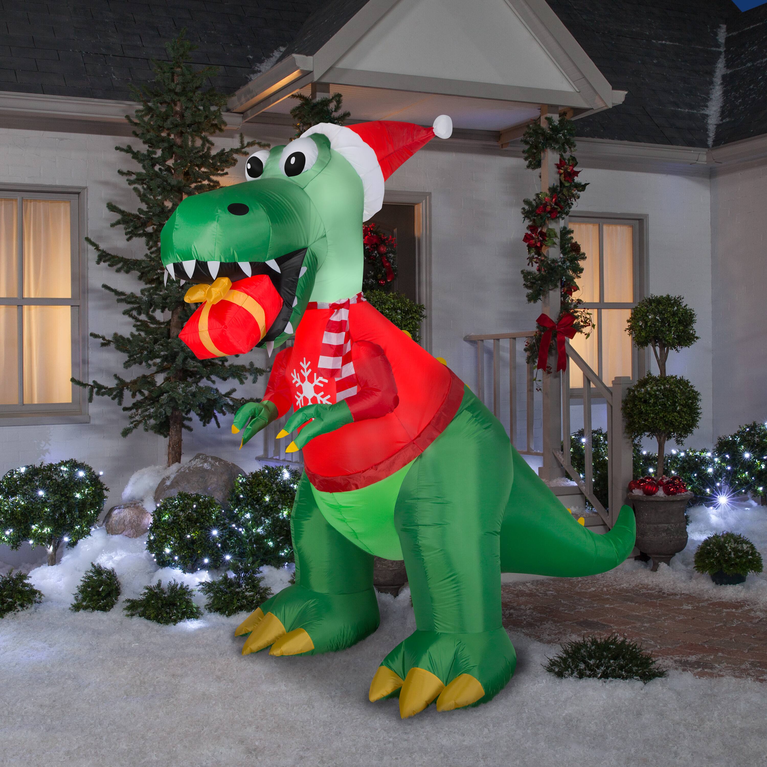 7.5ft. Airblown&#xAE; Inflatable Christmas T-Rex with Gift