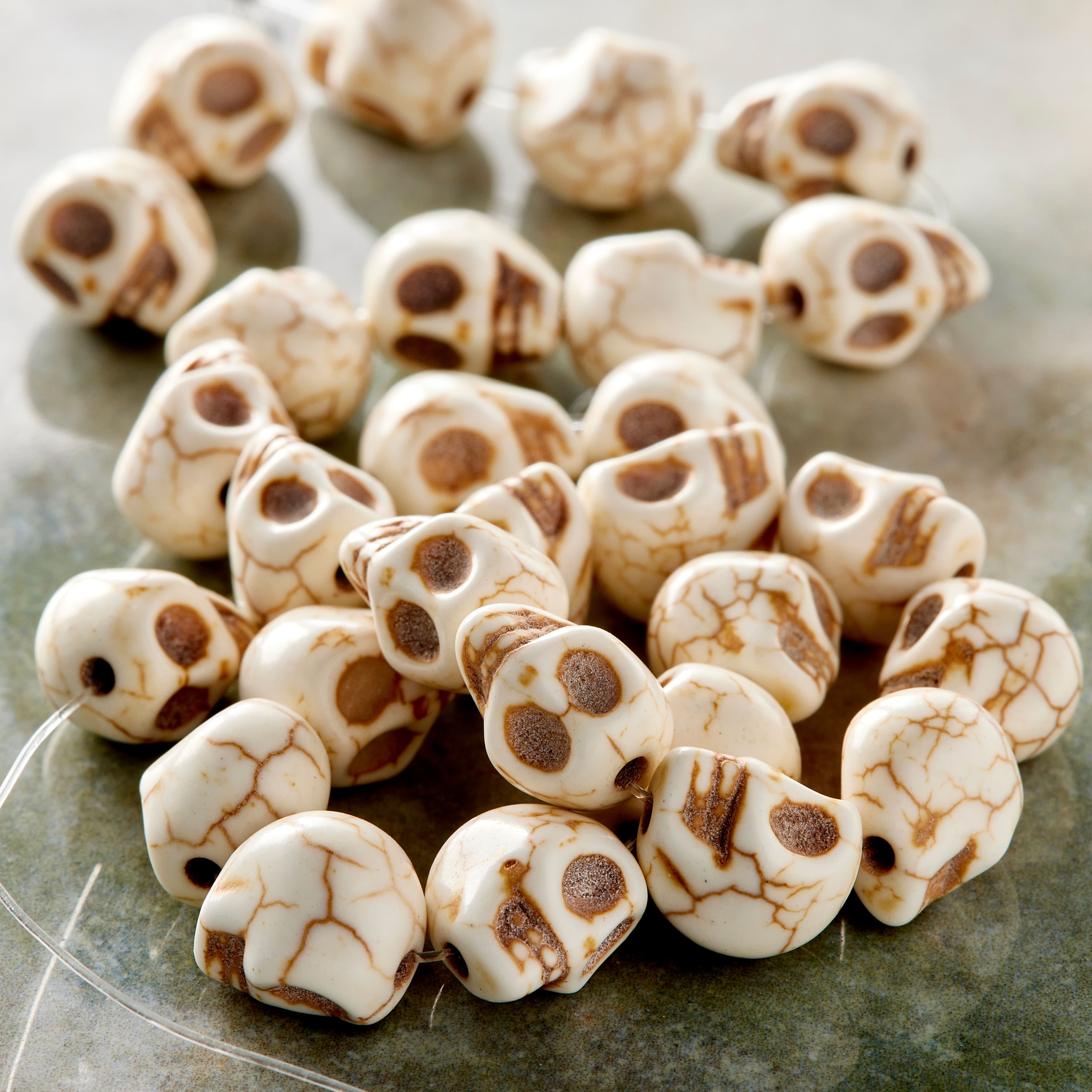 12 Pack: White Turquoise Skull Beads, 10mm by Bead Landing™