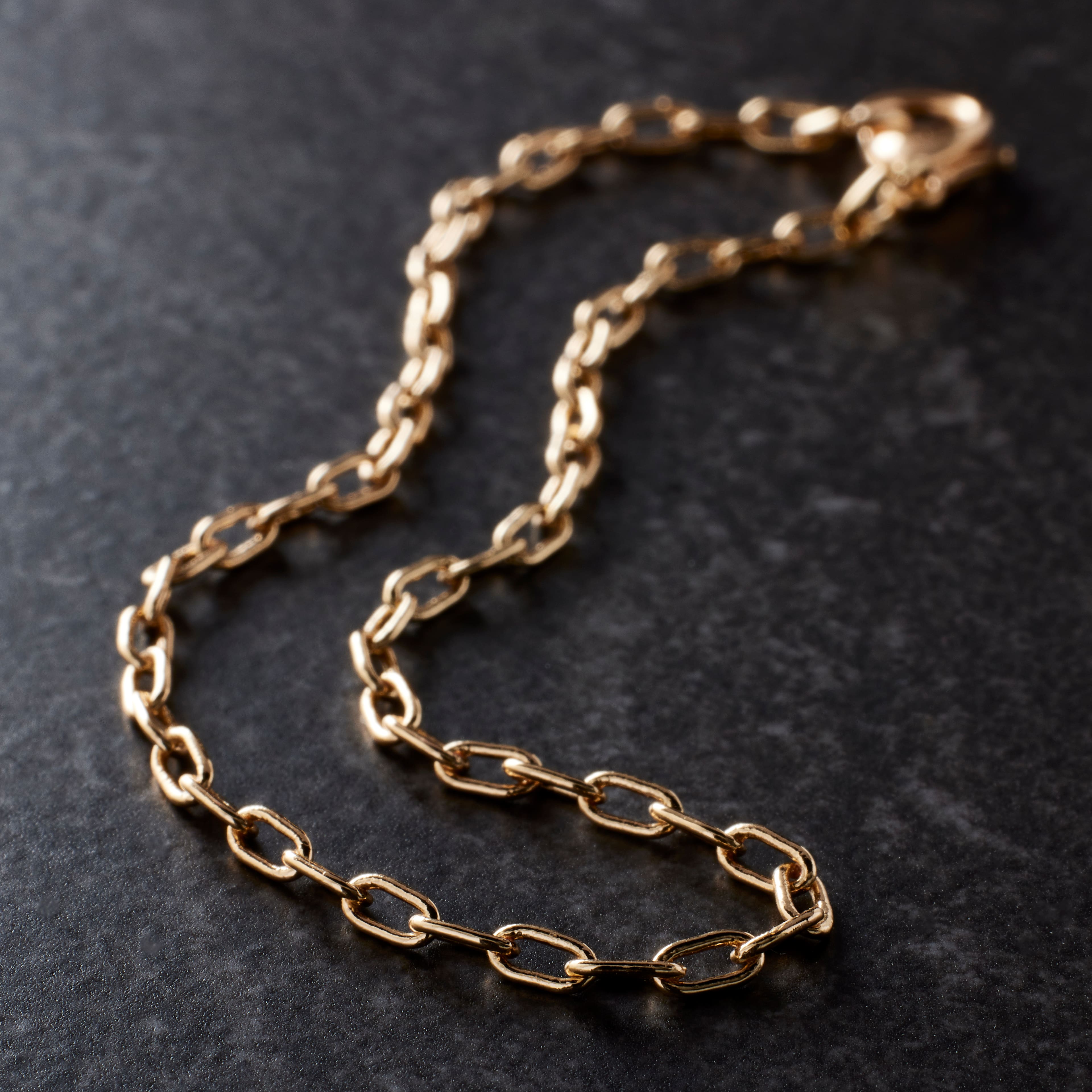 12 Pack: 7.5" Gold Paperclip Charm Bracelet by Bead Landing™