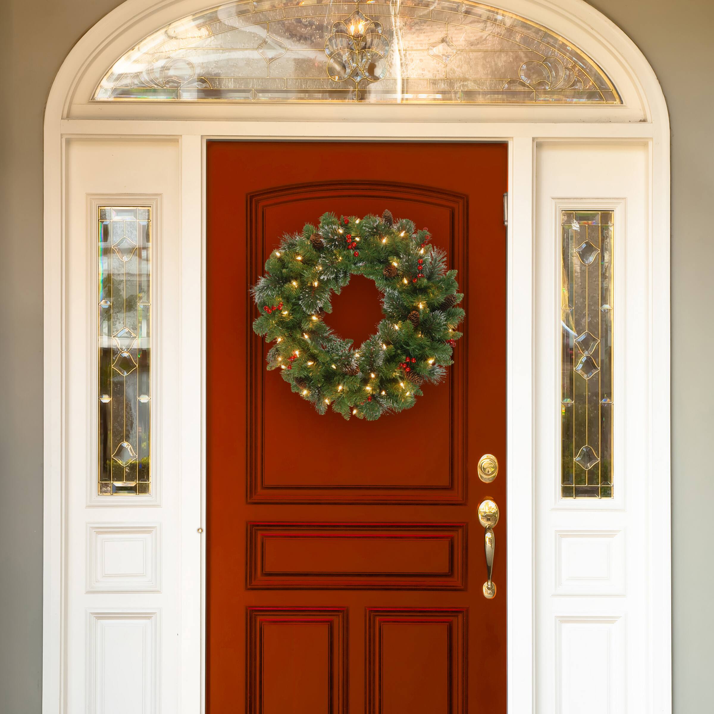 30&#x22; Crestwood&#xAE; Spruce Wreath with Cones, Red Berries, Glitter &#x26; 70ct. Warm White Battery Operated LED Lights with Timer