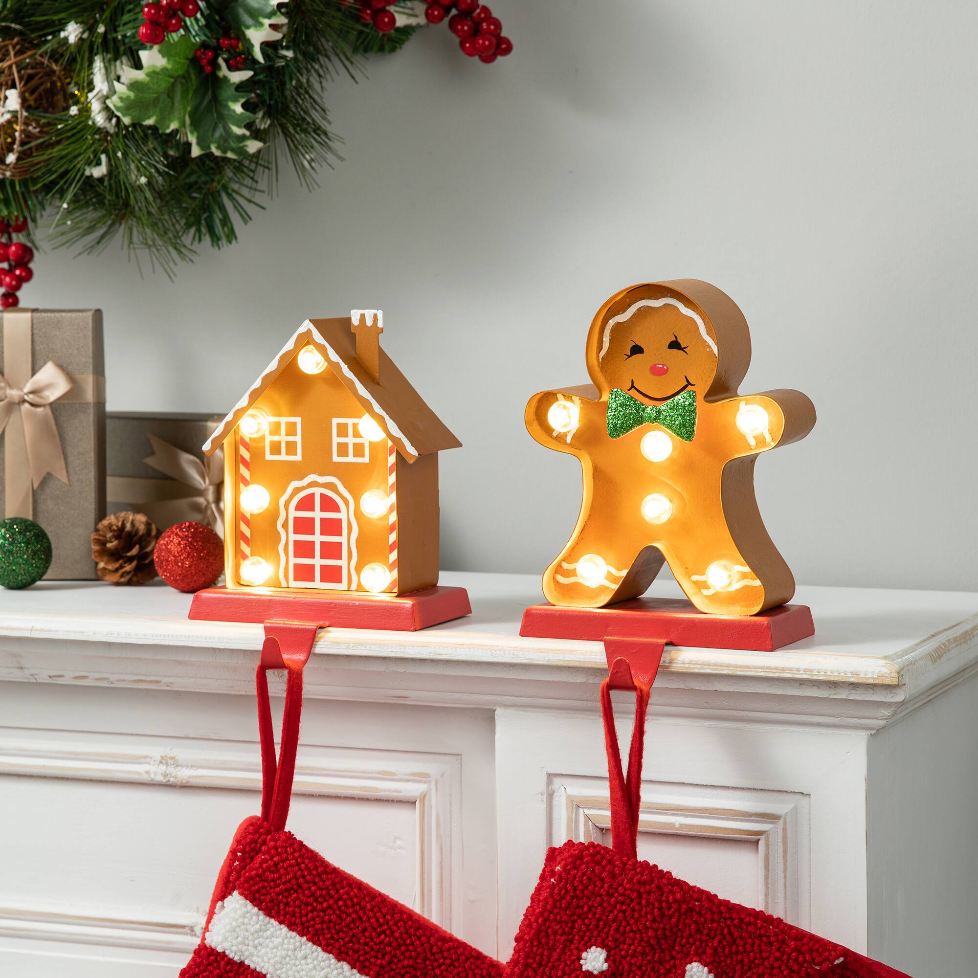 Glitzhome&#xAE; Marquee LED Gingerbread House &#x26; Gingerbread Man Christmas Stocking Holder Set