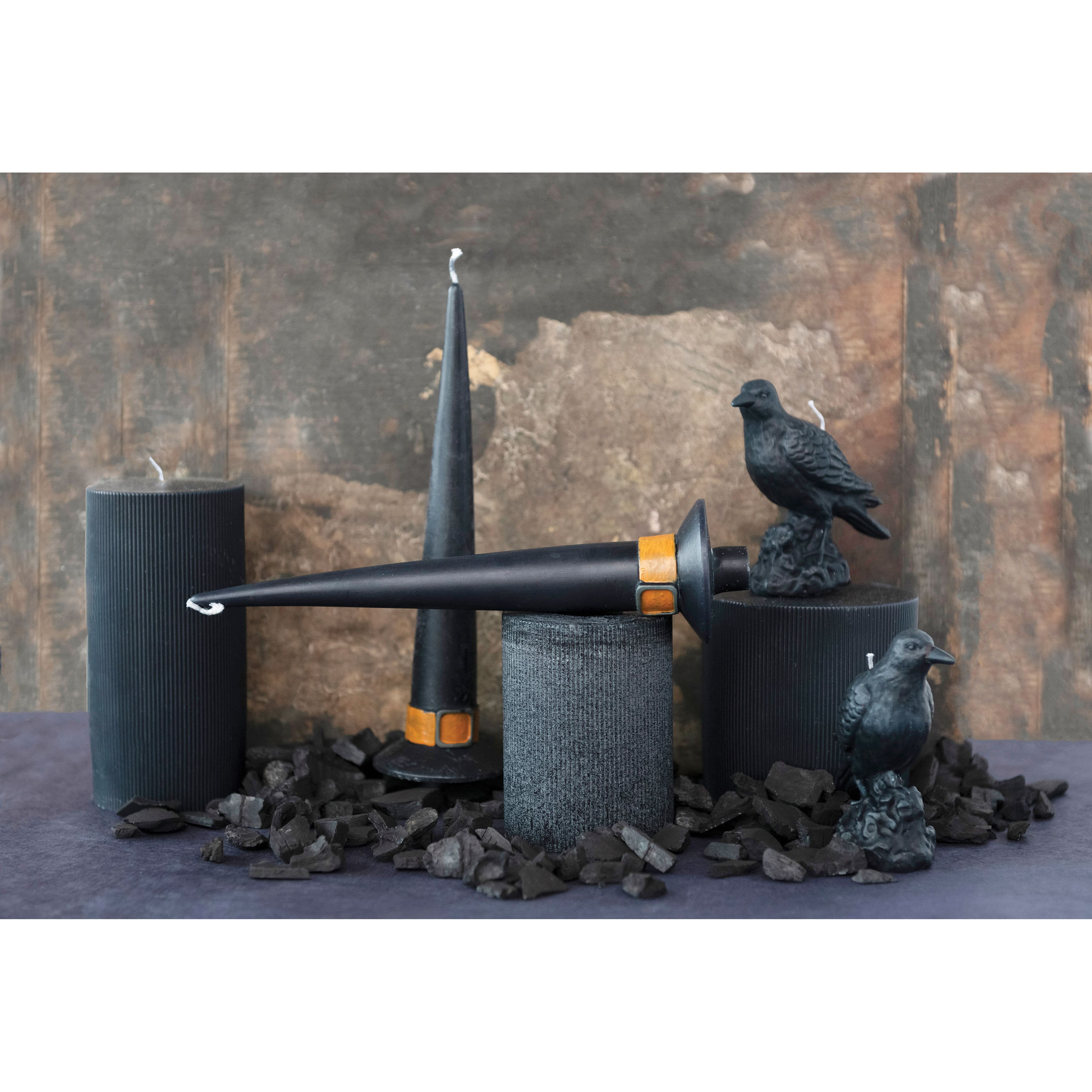 Unscented witch hat shaped taper black candle
