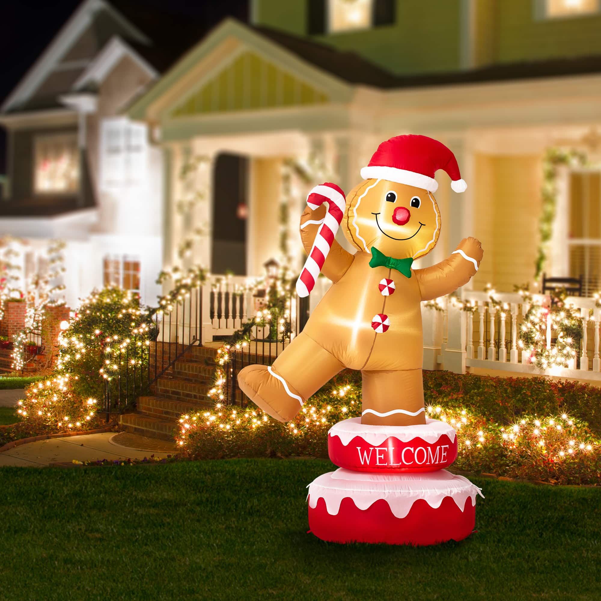 Glitzhome&#xAE; 6ft. Lighted Inflatable Rotating Gingerbread Man D&#xE9;cor