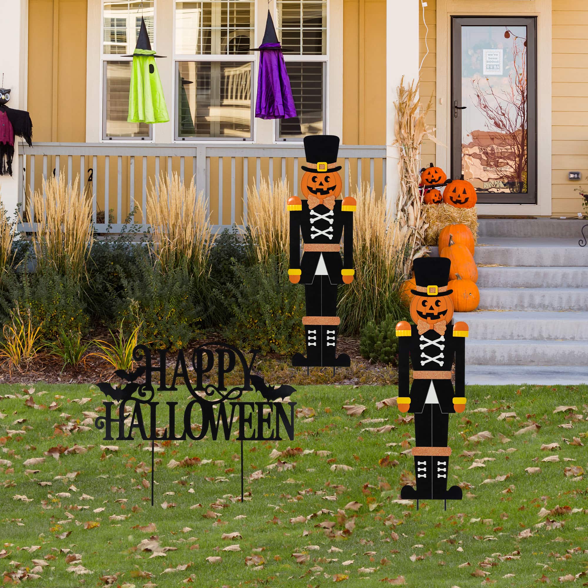 Glitzhome® 32"H Halloween Metal Nutcracker and HAPPY HALLOWEEN Yard Stake Set
