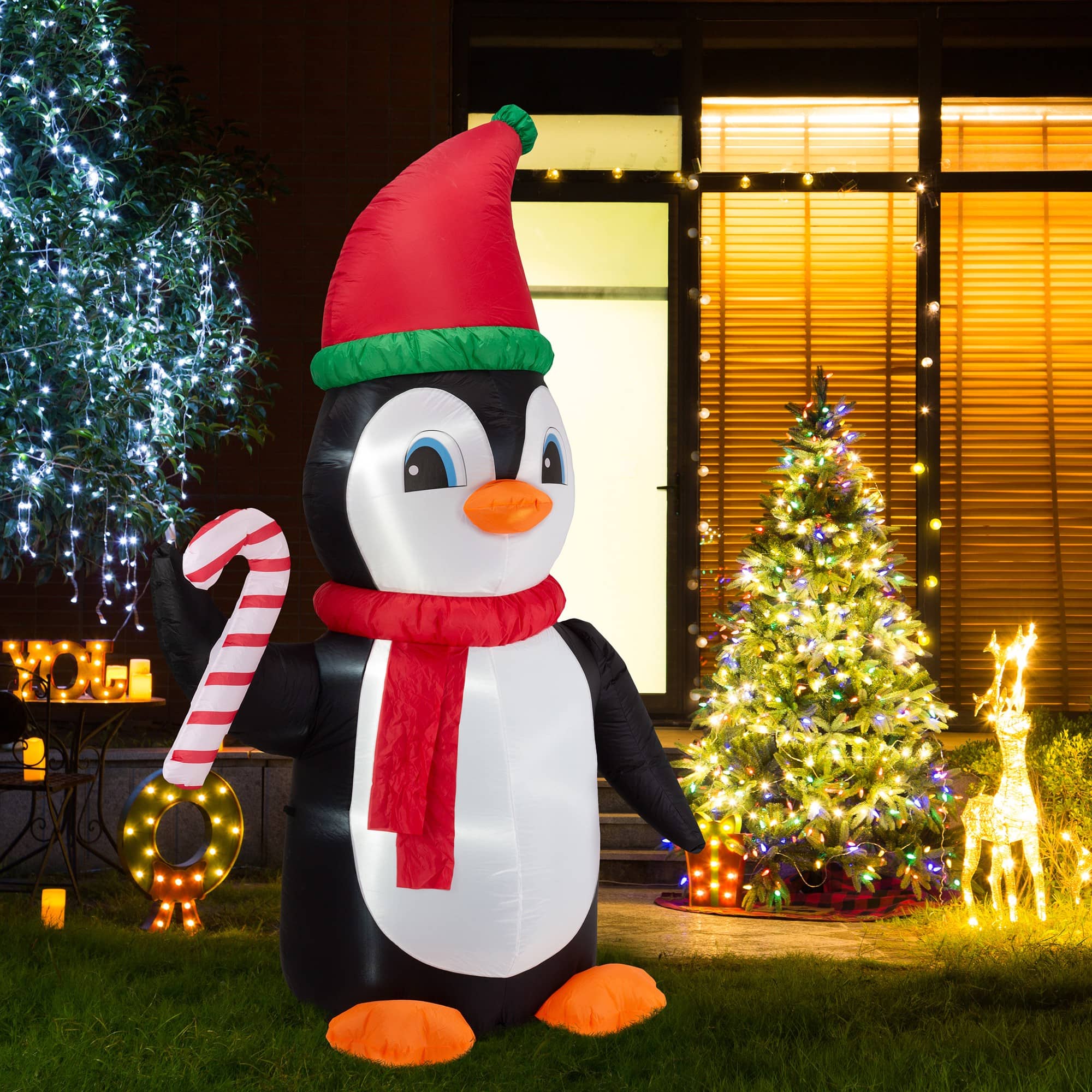 Glitzhome&#xAE; 8ft. Lighted Inflatable Penguin