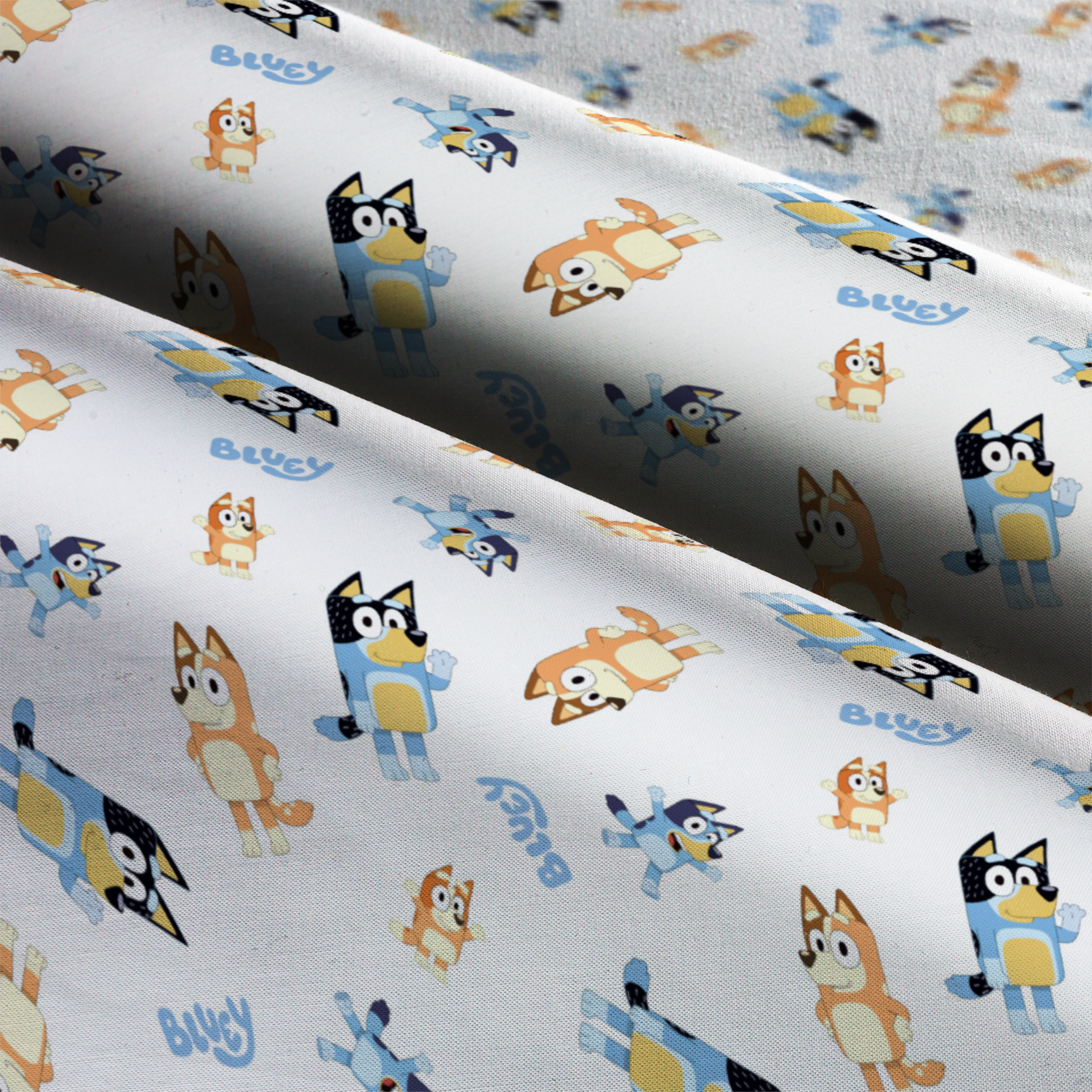 Bluey Toss on White Cotton Fabric