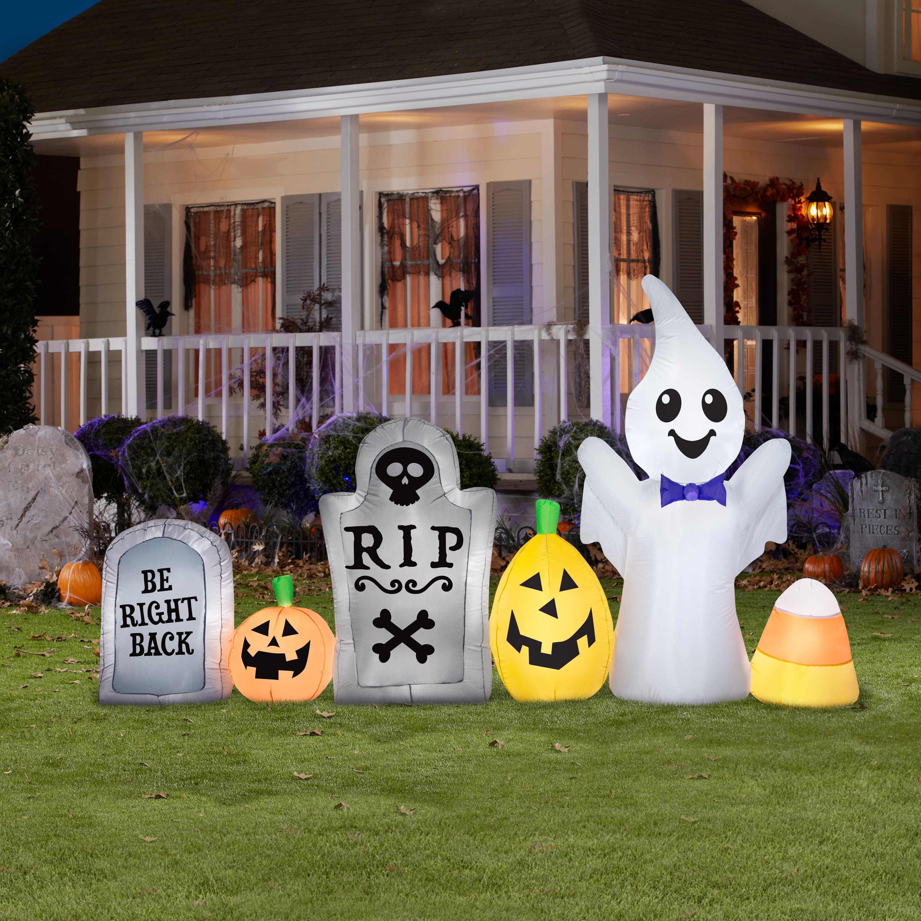 9ft. Airblown&#xAE; Inflatable Halloween Ghost in Cemetery Scene
