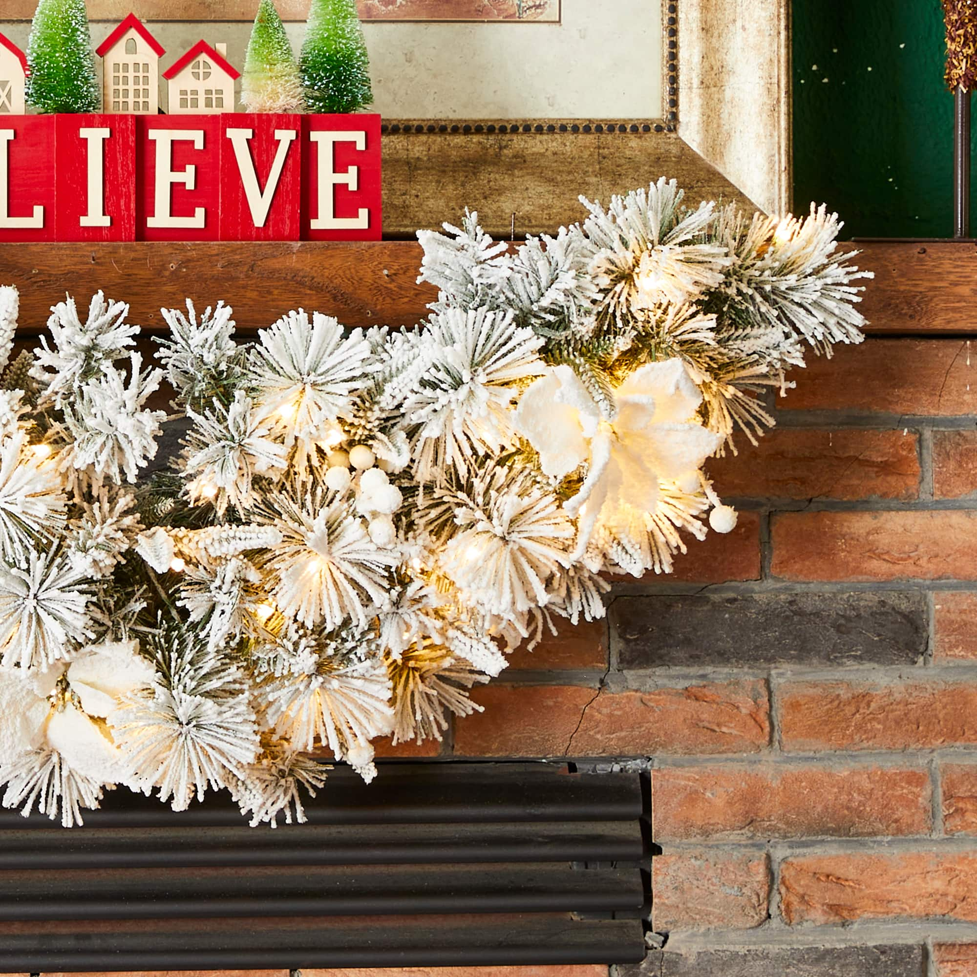 Glitzhome&#xAE; 36&#x22; Pre-Lit Flocked Greenery Pine White Poinsettia &#x26; Berry Christmas Swag with Timer