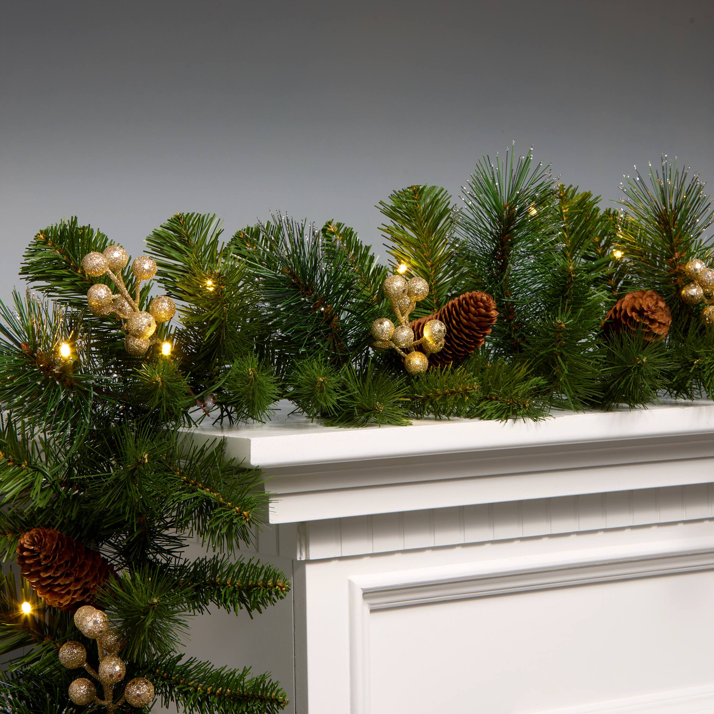 9ft. Crestwood&#xAE; Green &#x26; Gold Spruce &#x26; Pinecone Pre-Lit LED Garland