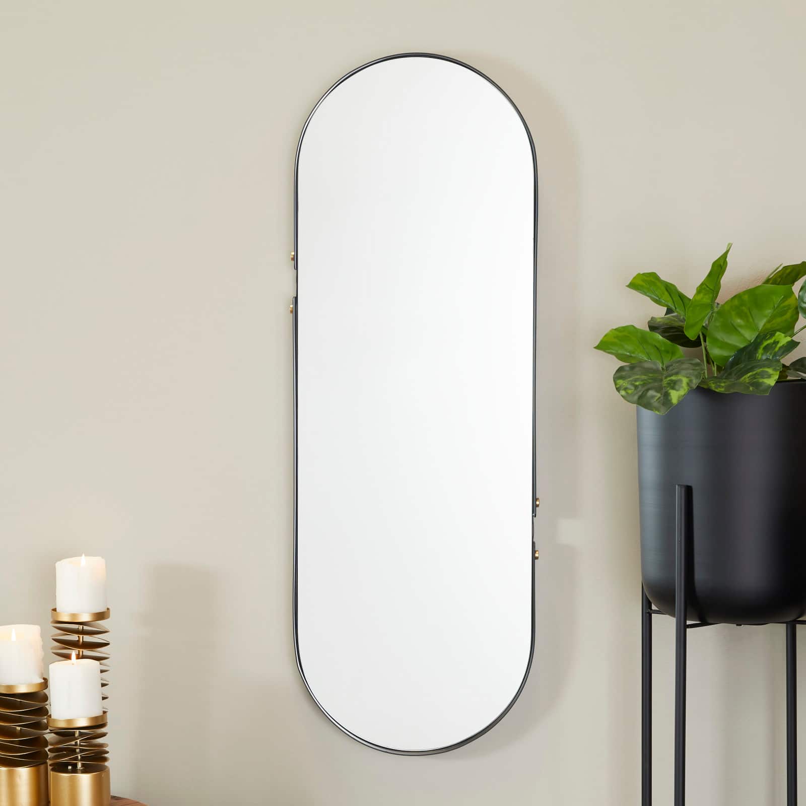CosmoLiving by Cosmopolitan Black Metal Oval Wall Mirror 15" x 2" x 43"
