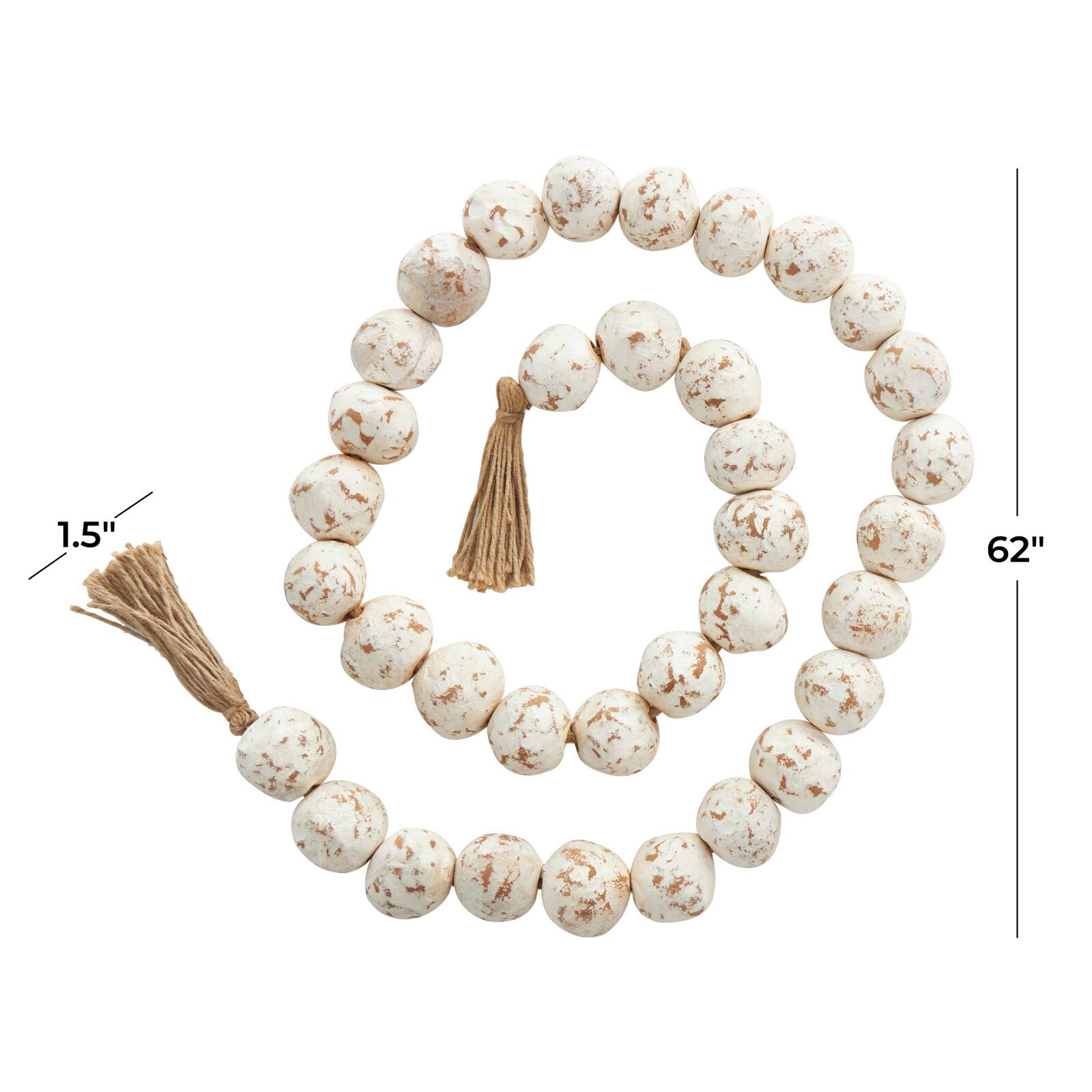 5ft. Paper Mache Round Distressed Beaded Garland with Tassel