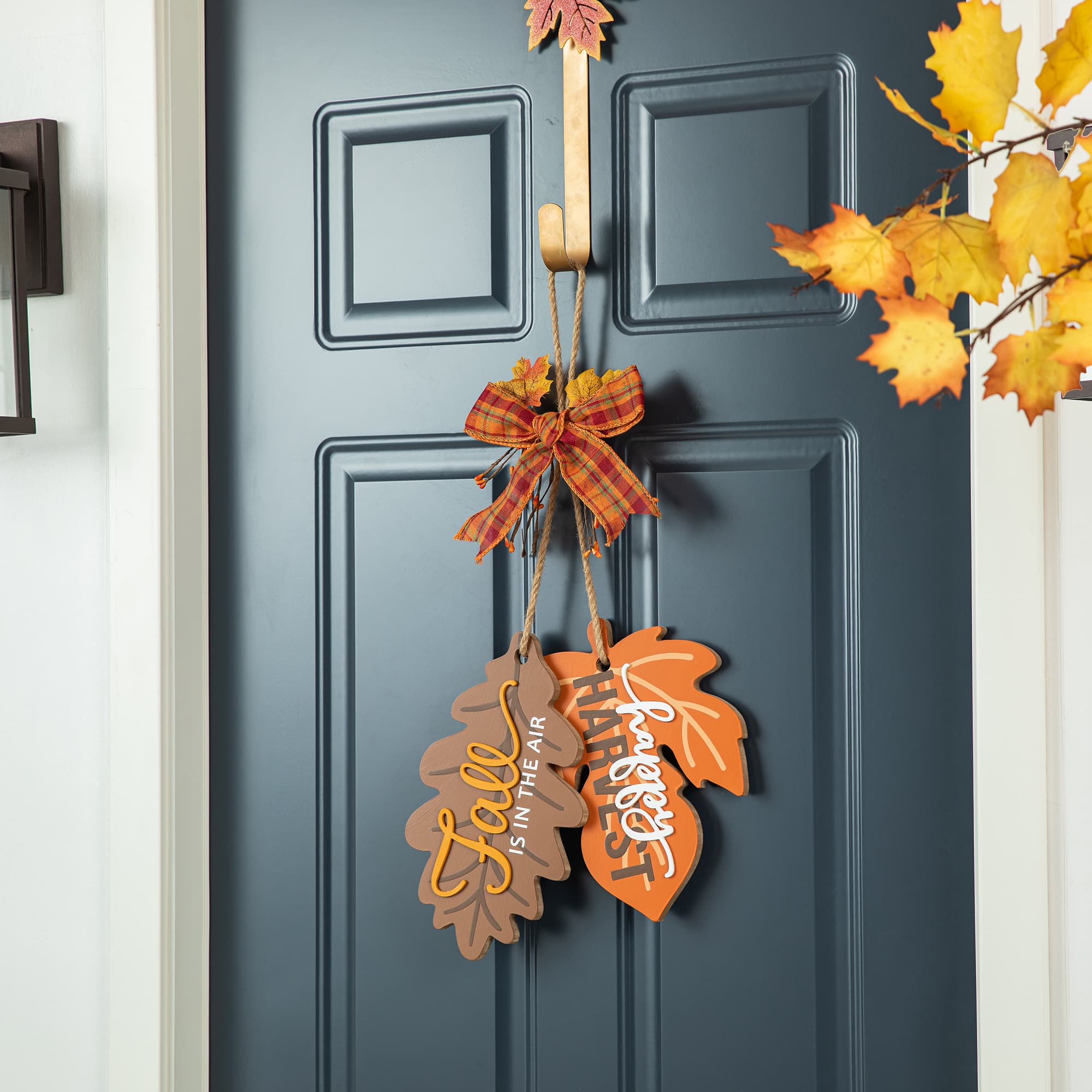 Glitzhome&#xAE; 24.5&#x22; Fall Wood Maple Leaves with Bowknot Door Hanger