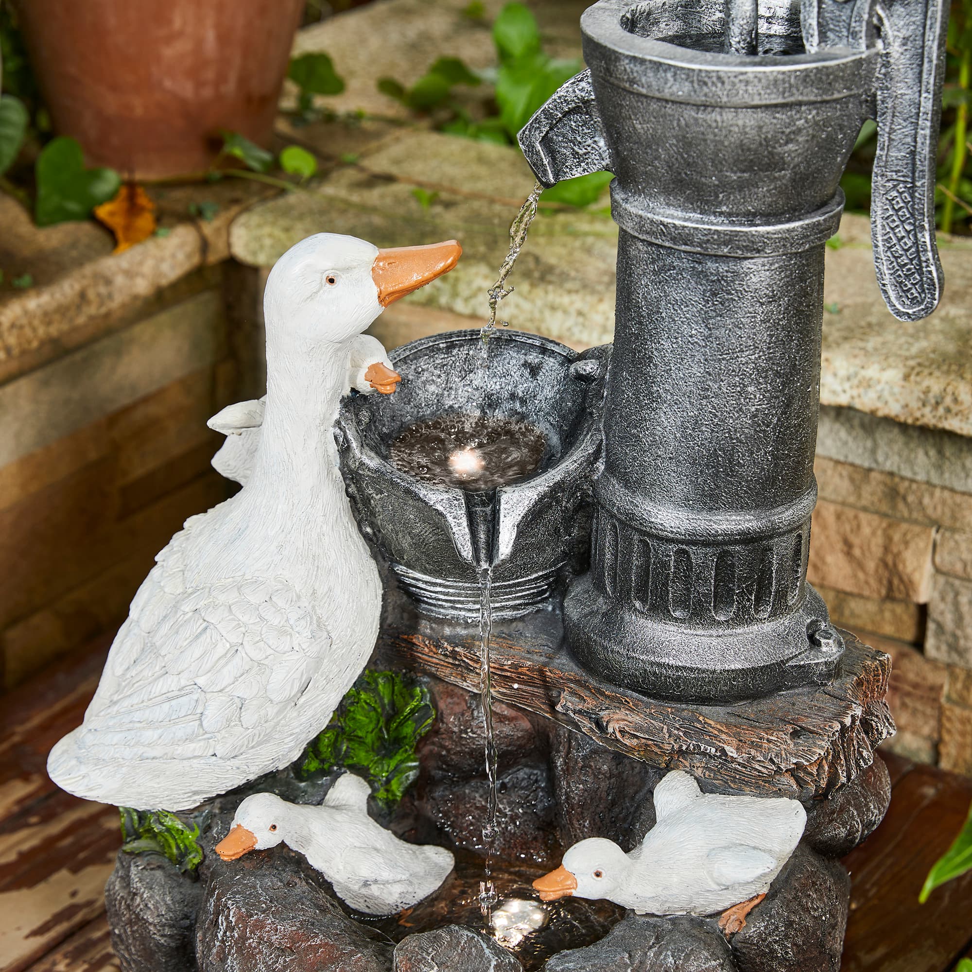 Glitzhome&#xAE; 23.5&#x22; Duck Family Outdoor Fountain with LED Light