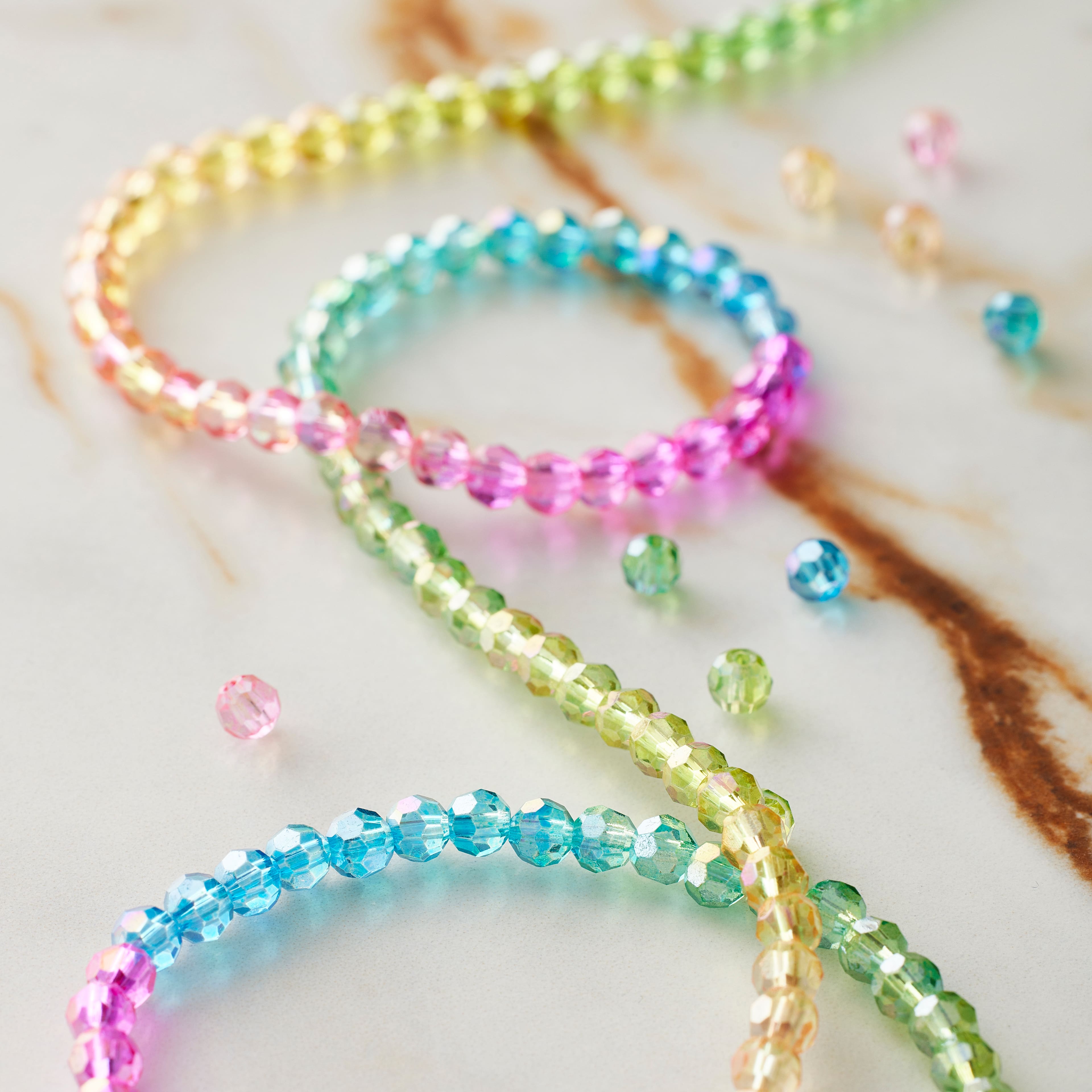 12 Pack: Rainbow Glass Faceted Round Beads, 3.5mm by Bead Landing™