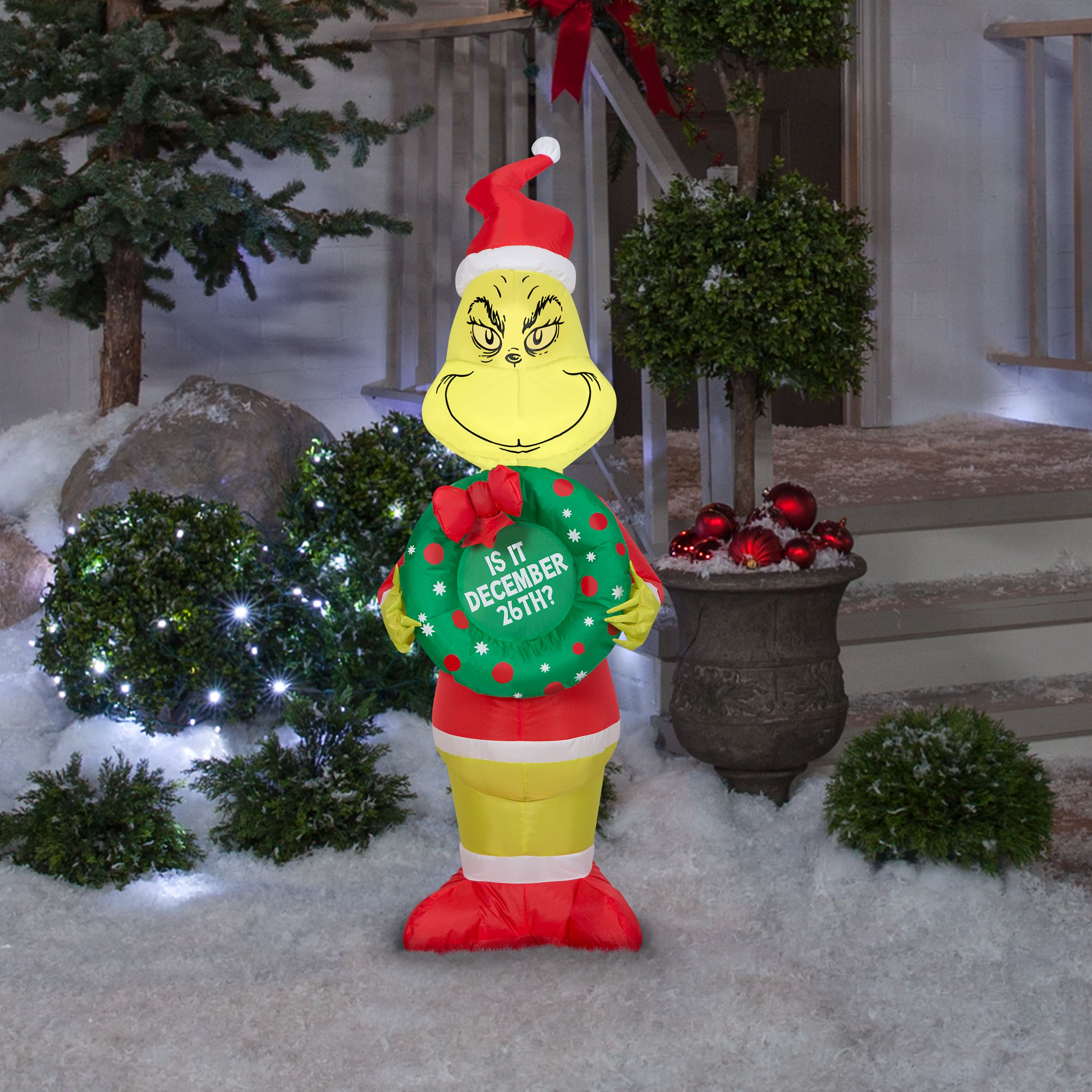 4ft. Airblown® Inflatable Christmas Grinch with Wreath | Michaels