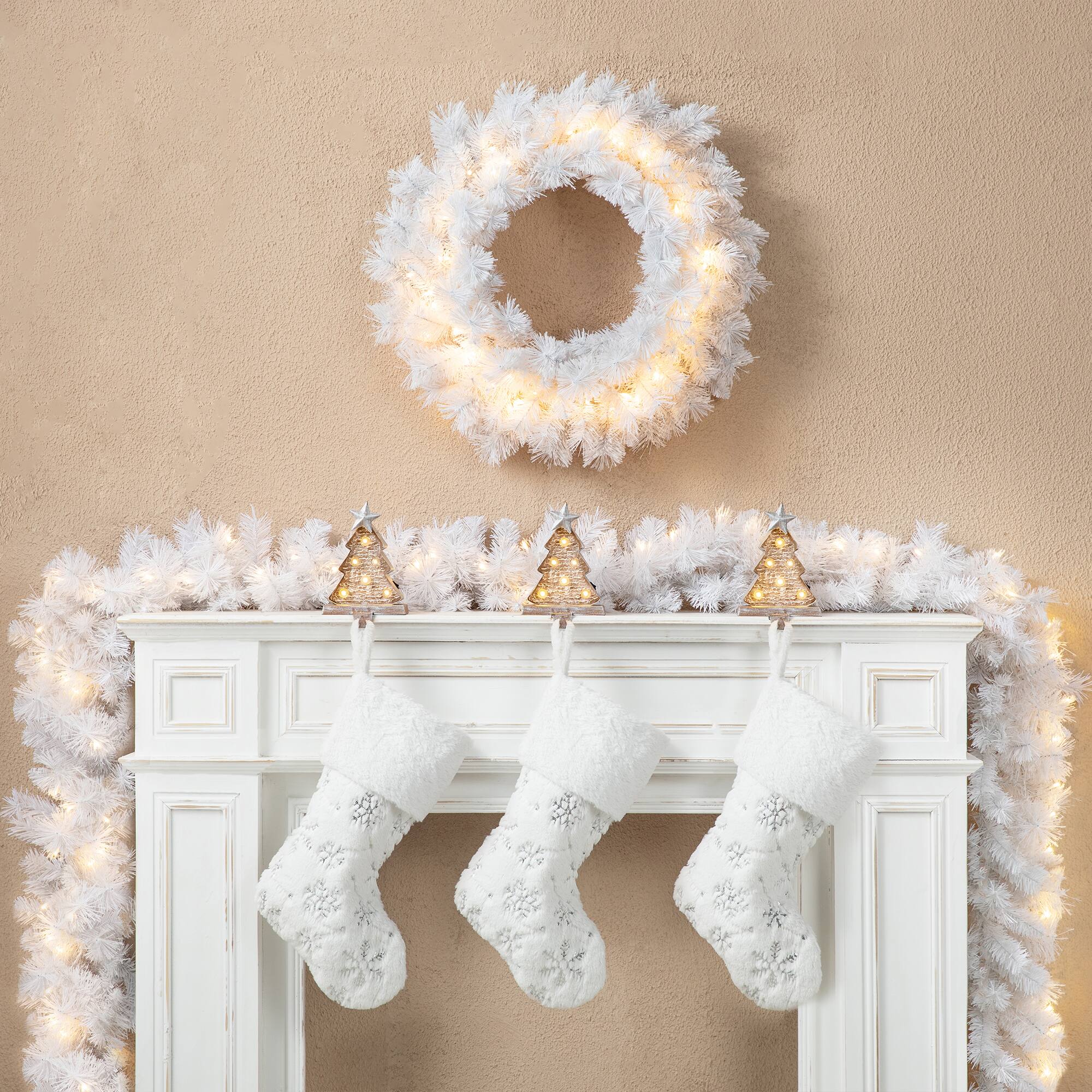 Glitzhome&#xAE; 9ft. Pre-Lit White Pine Christmas Garland with LED Lights and Timer