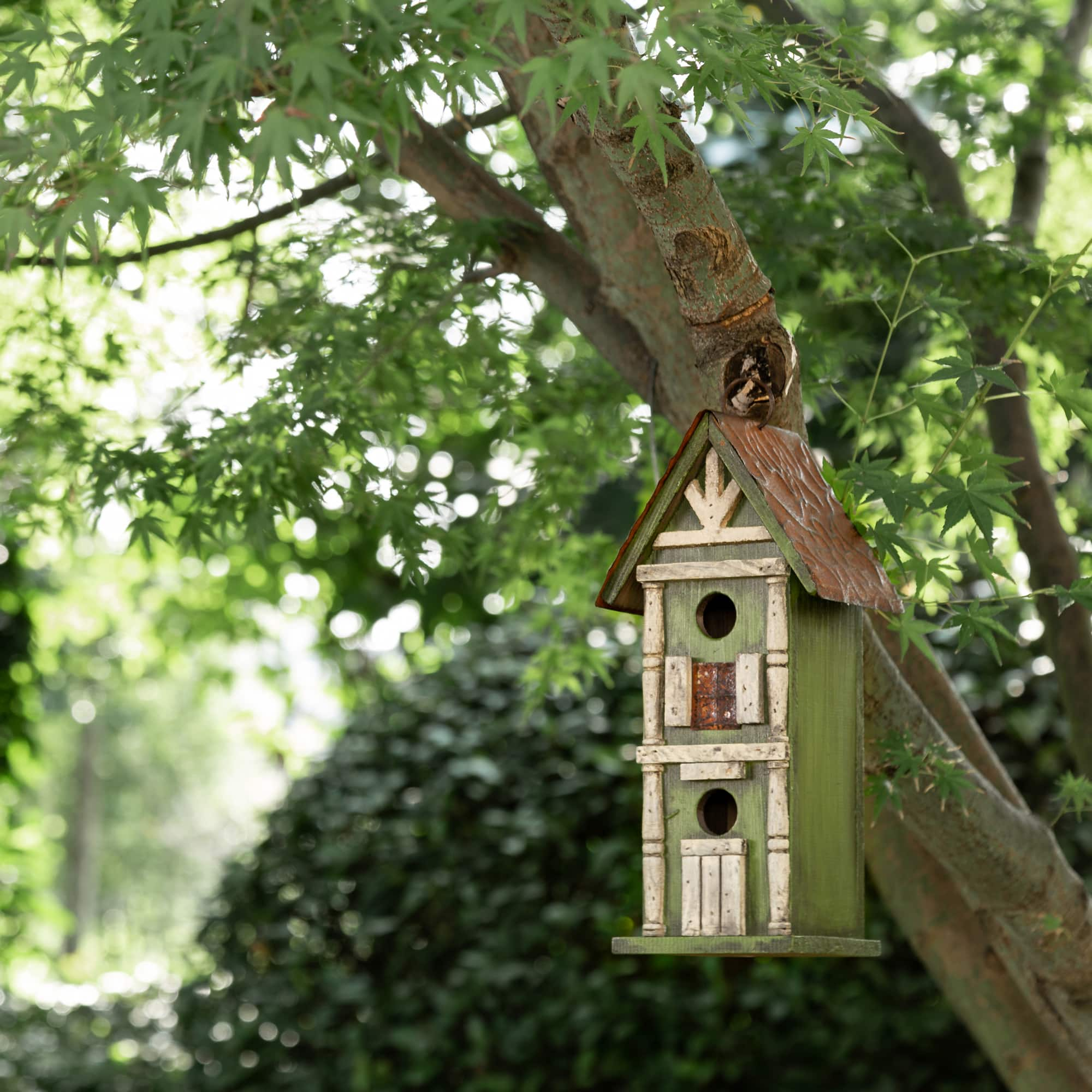 Glitzhome&#xAE; Tall 2-Tiered Distressed Wood Hand Painted Bird House