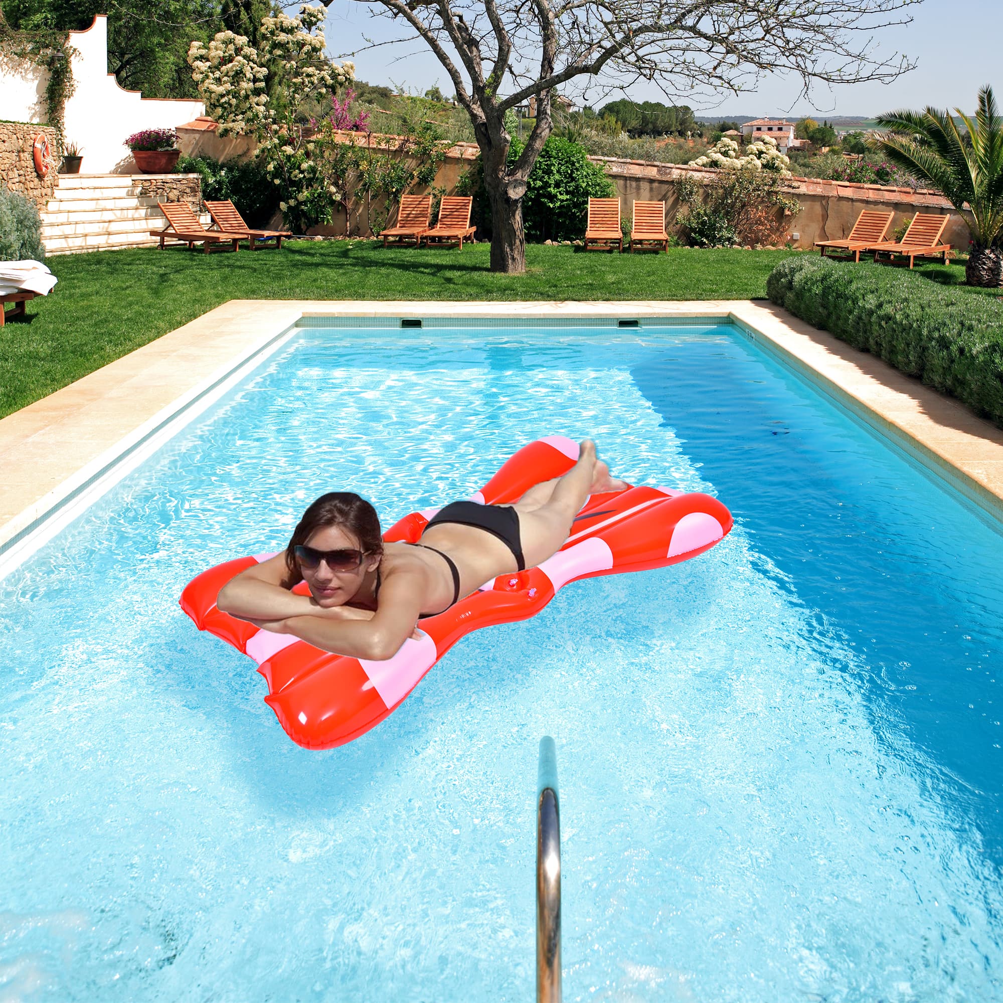 Pool Central 5.7ft. Inflatable Red &#x26; White Jumbo Hair Bow Pool Float