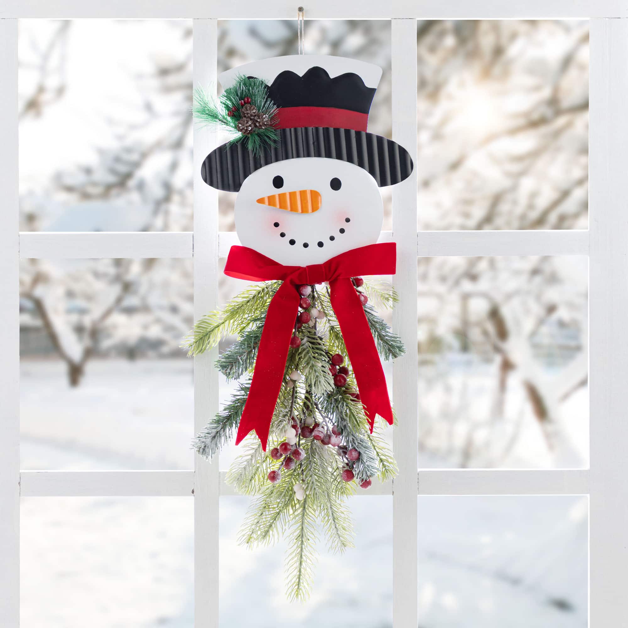 Glitzhome&#xAE; 25&#x22; Greenery Snowman Door Hanger