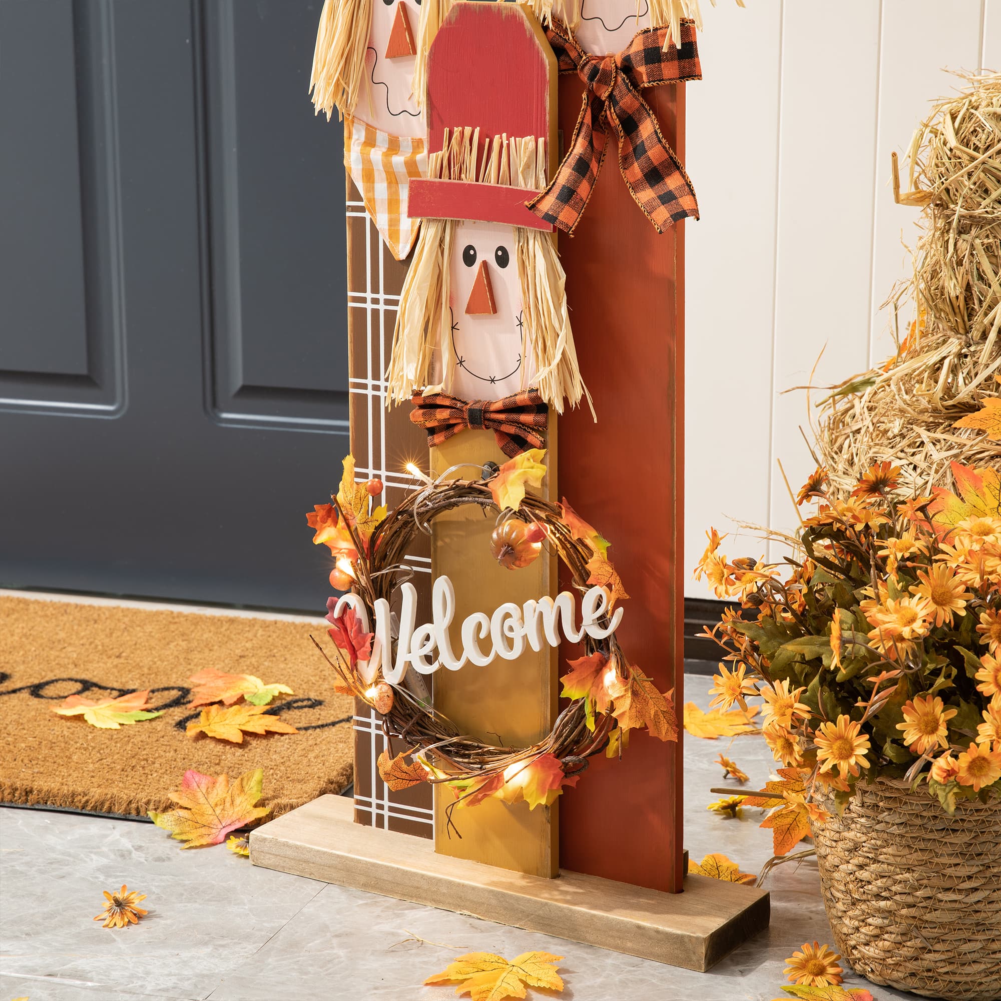 Glitzhome&#xAE; 36.25&#x22; Wooden Scarecrow Family Porch D&#xE9;cor with Lighted Wreath &#x26; Timer