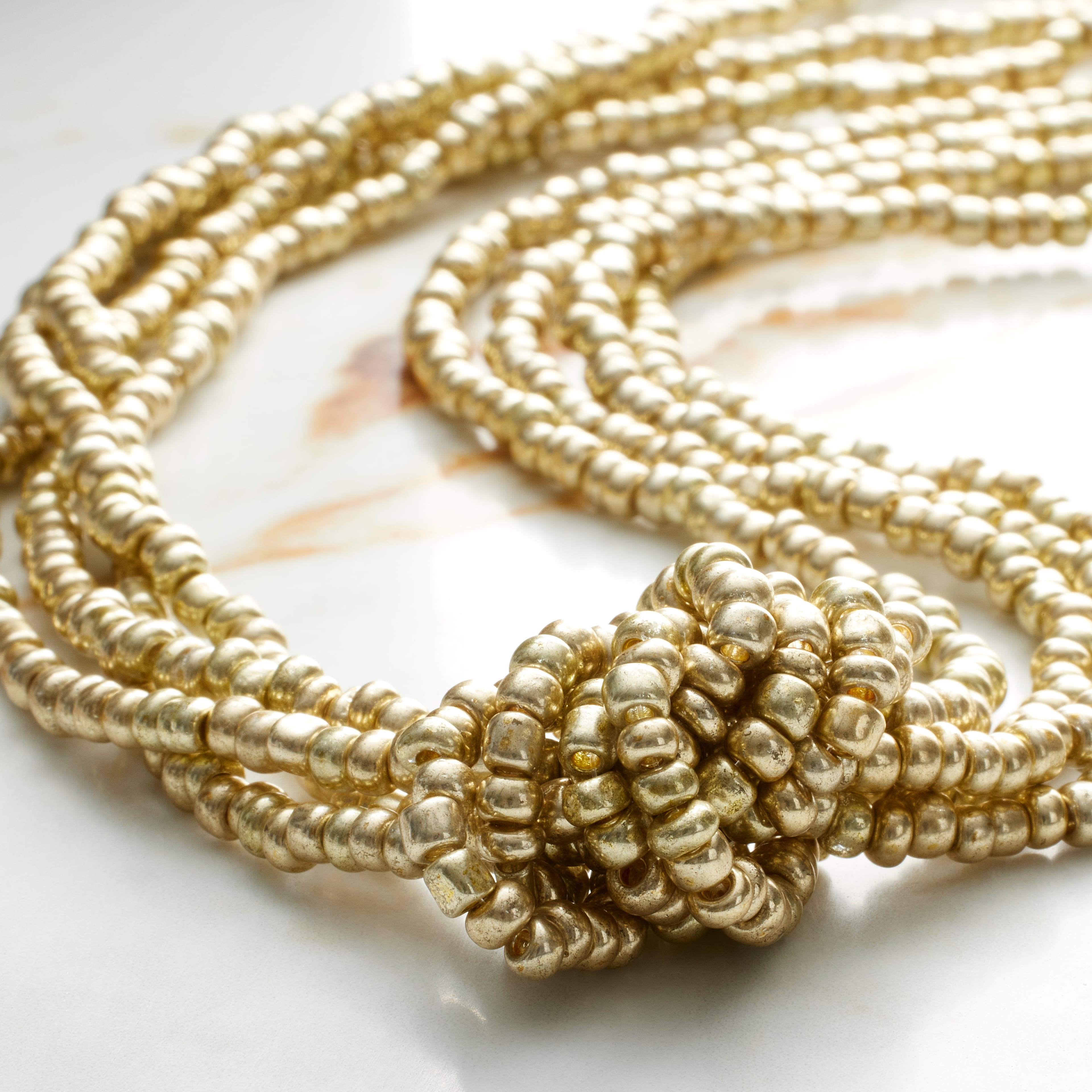 12 Pack: Light Gold Glass Seed Beads, 6/0 by Bead Landing™