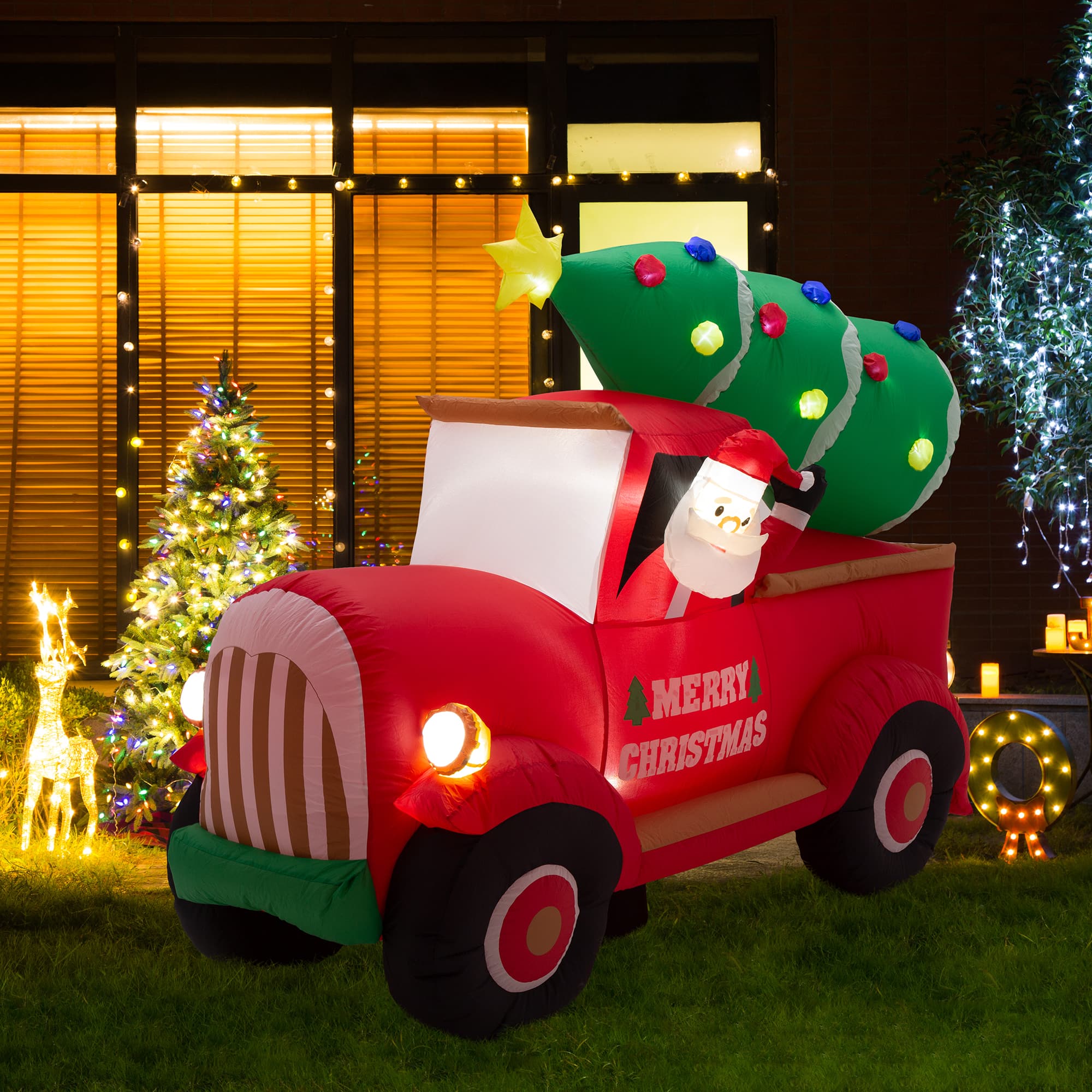 Glitzhome&#xAE; 7ft. Inflatable Santa Claus On Truck