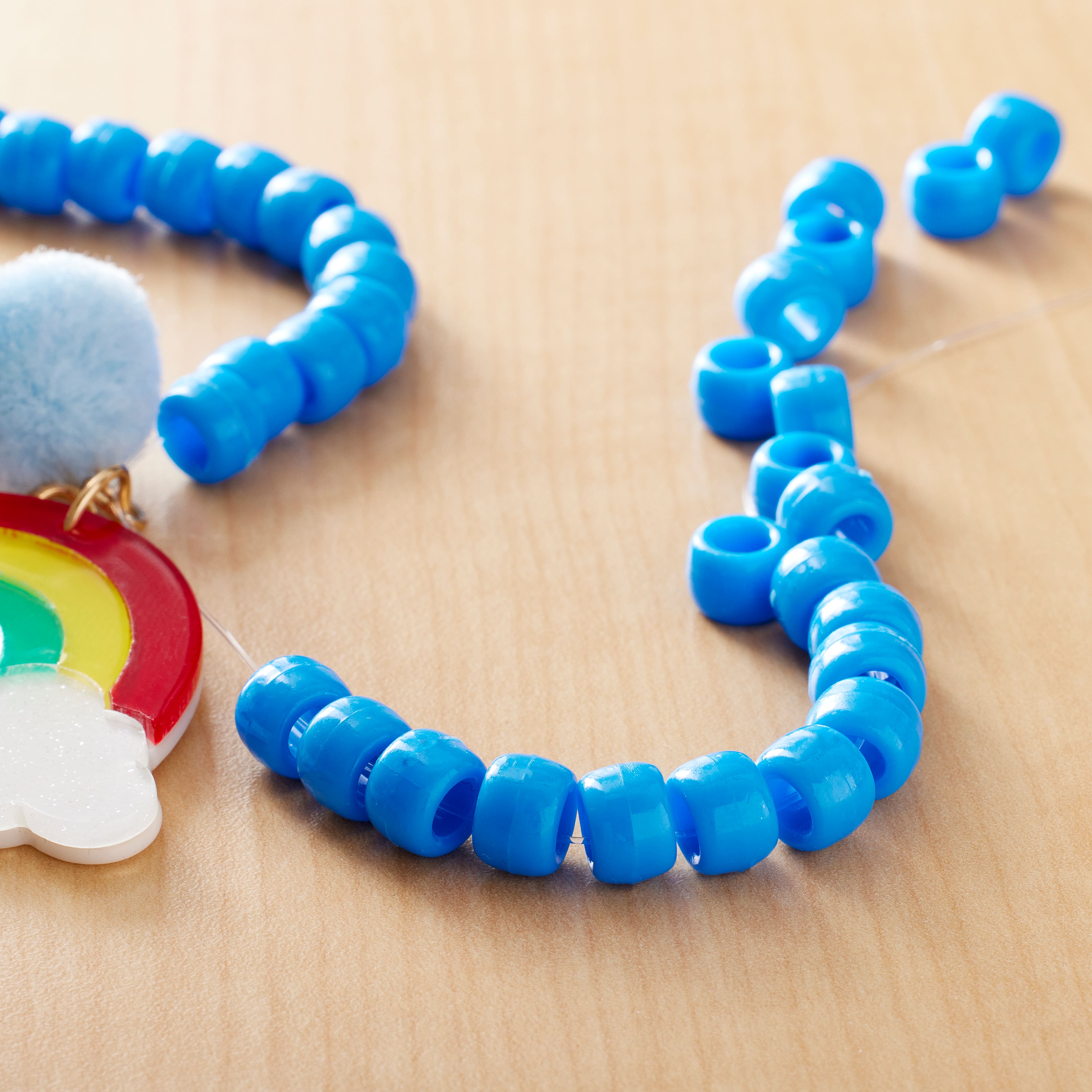 12 Packs: 580 ct. (6,960 total) Opaque Pony Beads by Creatology™, 6mm x 9mm