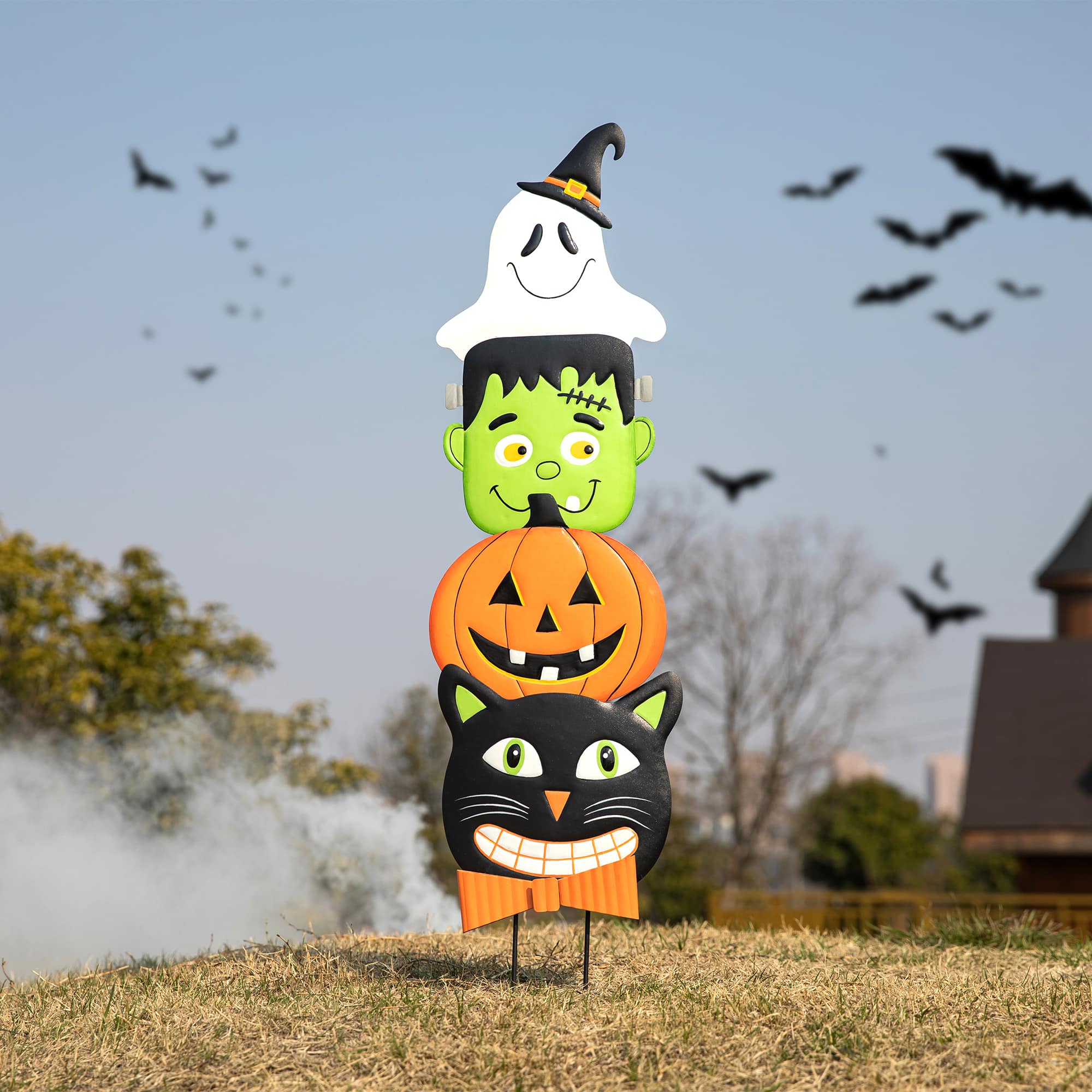 Glitzhome&#xAE; 3.5ft. Halloween Metal Stacked Ghost, Frankenstein, Black Cat and Pumpkin Yard Stake