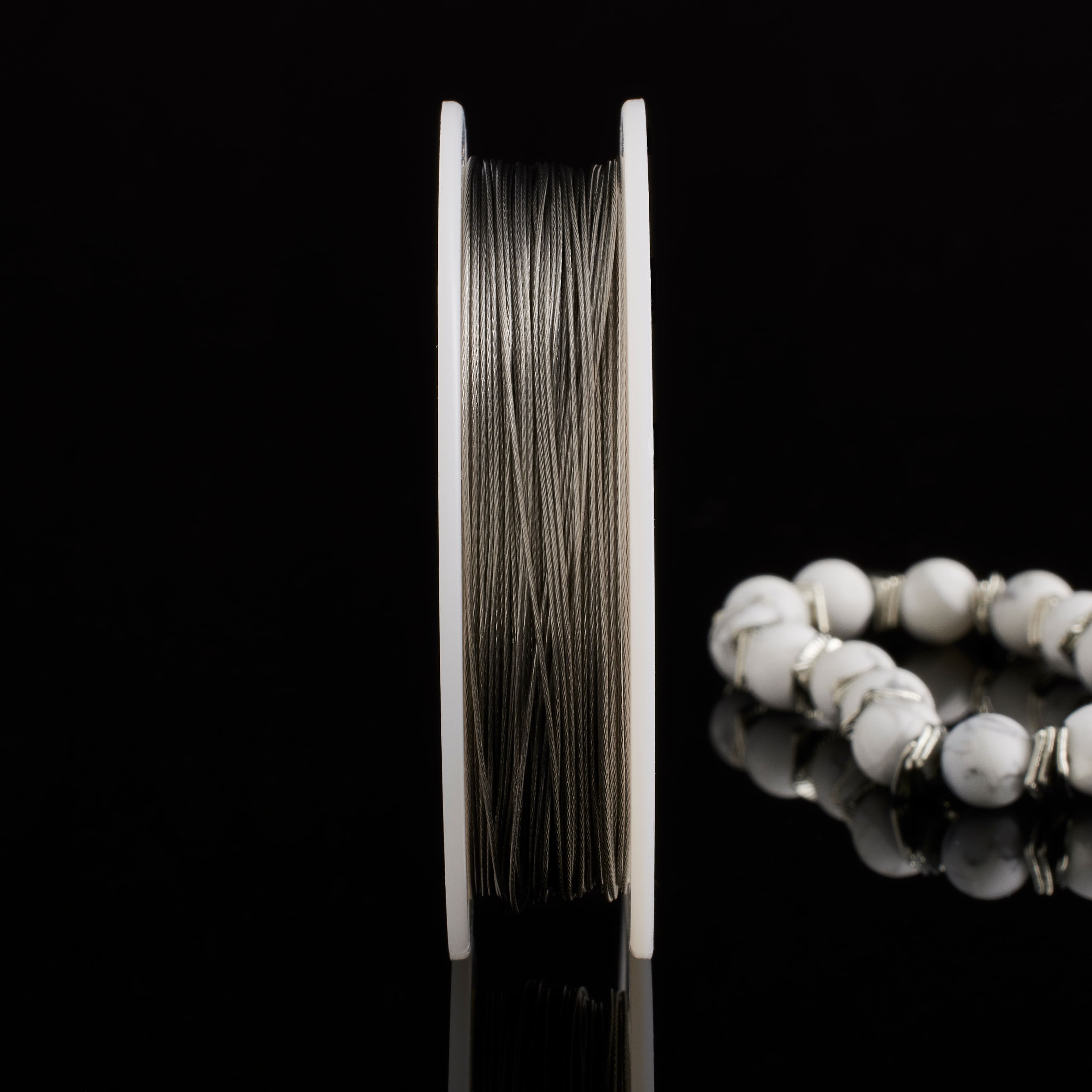 12 Pack: Beadalon® 0.018" Bright 7 Strand Bead Stringing Wire, 100ft.