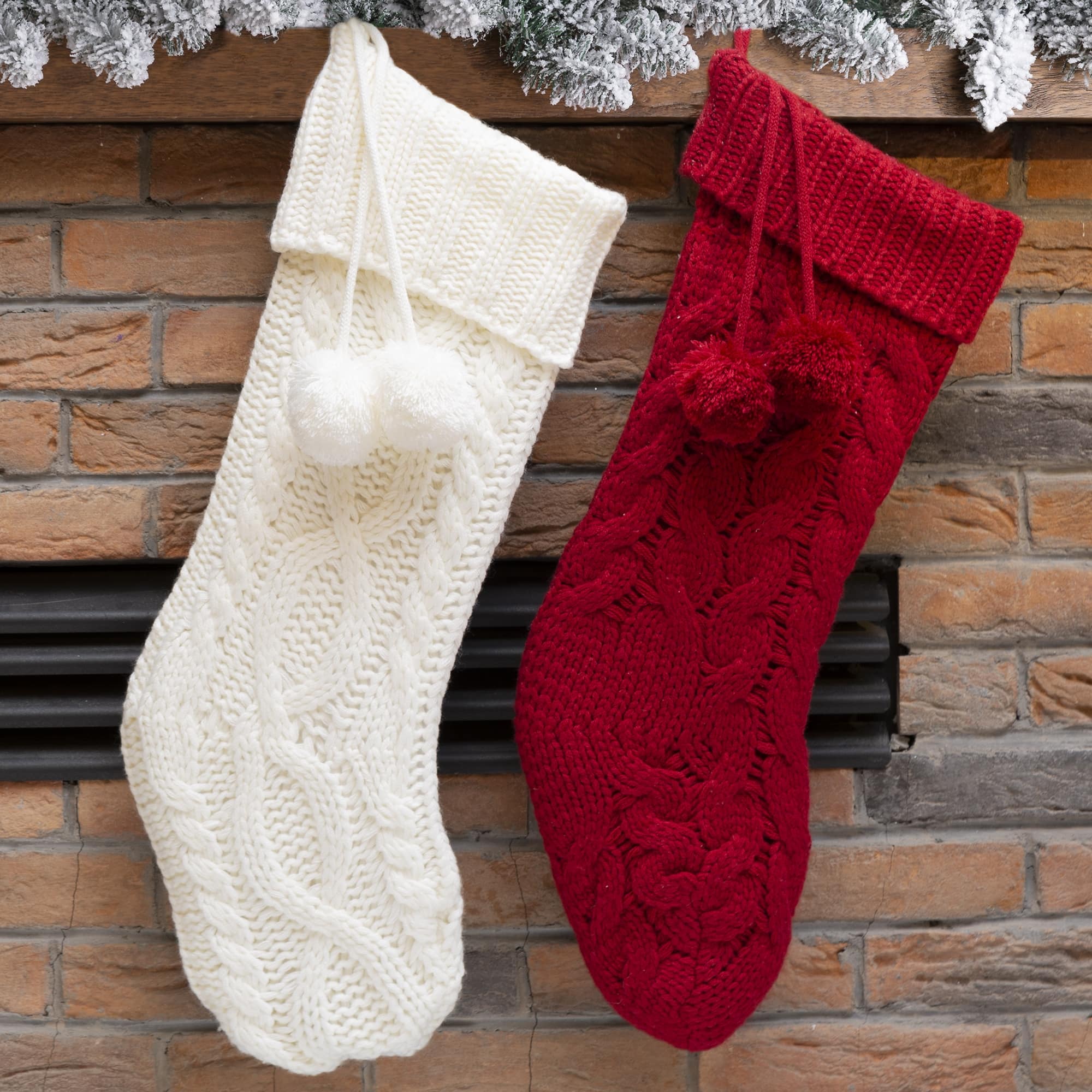 Glitzhome&#xAE; 24&#x22;Knitted Christmas Stockings with Pom Pom Balls, 2ct.