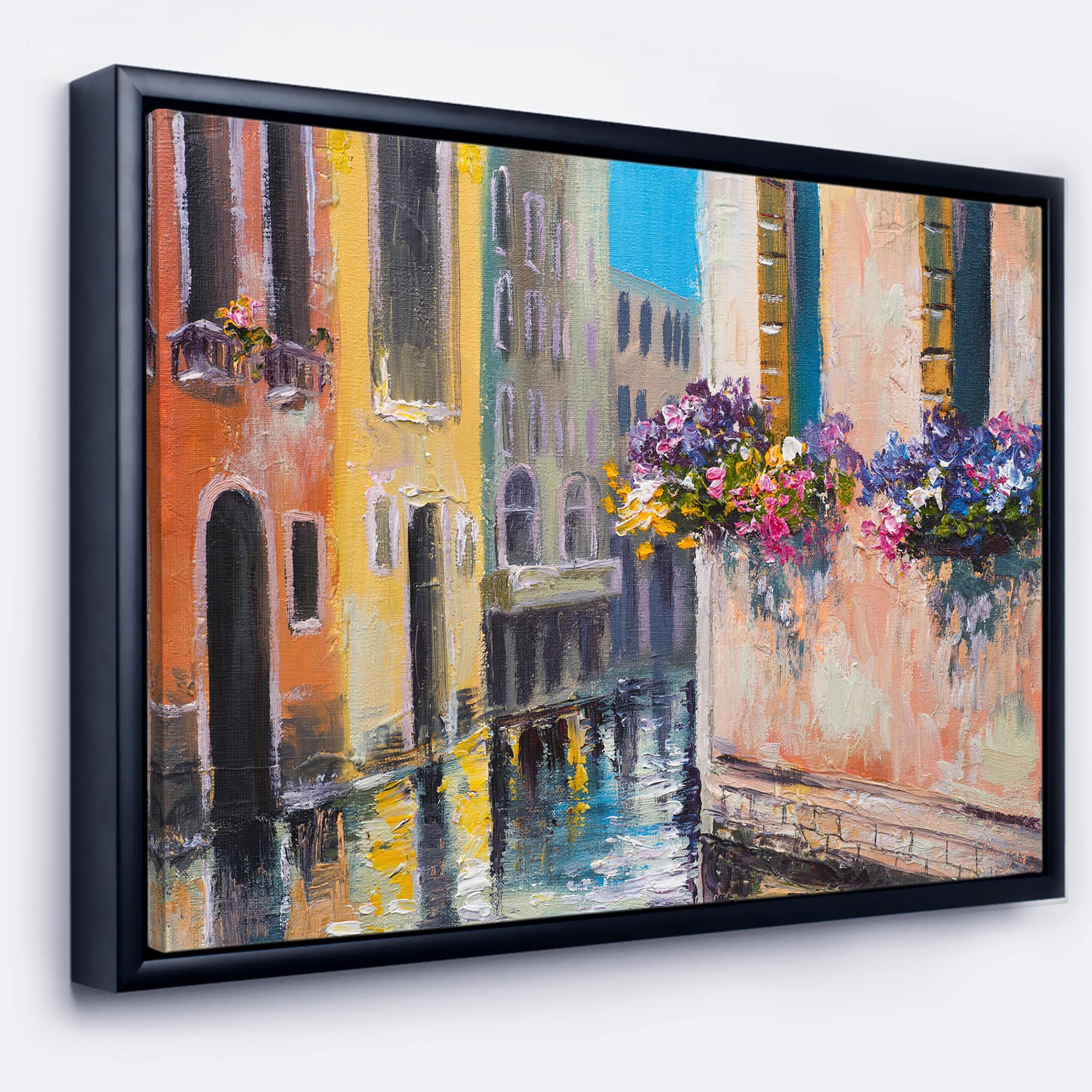 Designart - Canal in Venice with Flowers - Cityscape Canvas Art Print in Black Frame