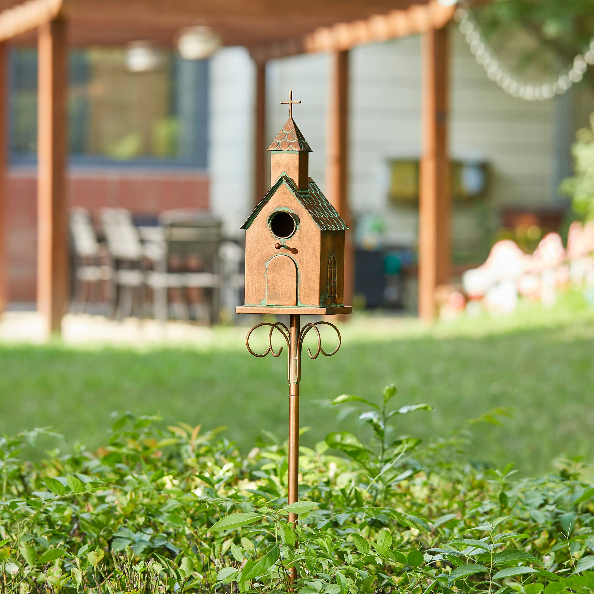 Glitzhome&#xAE; 4ft. Faux Copper Distressed Metal Church Birdhouse with Stake