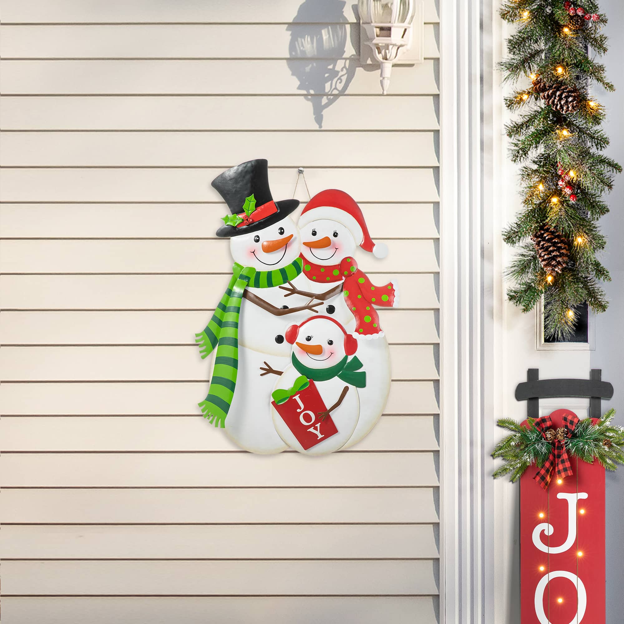 Glitzhome&#xAE; 2.5ft. Metal Snowman Family Yard Stake