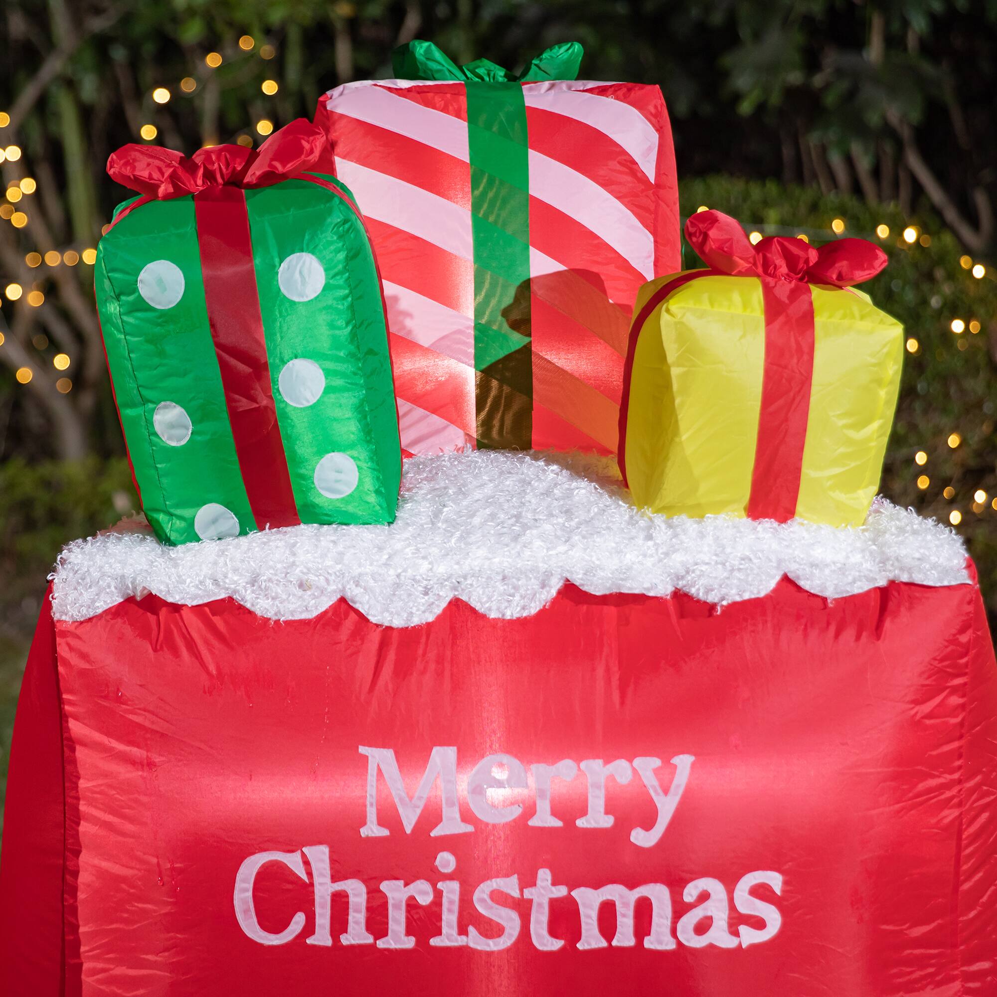 Glitzhome® 8ft. Lighted Inflatable Santa On Pick-Up Train Décor