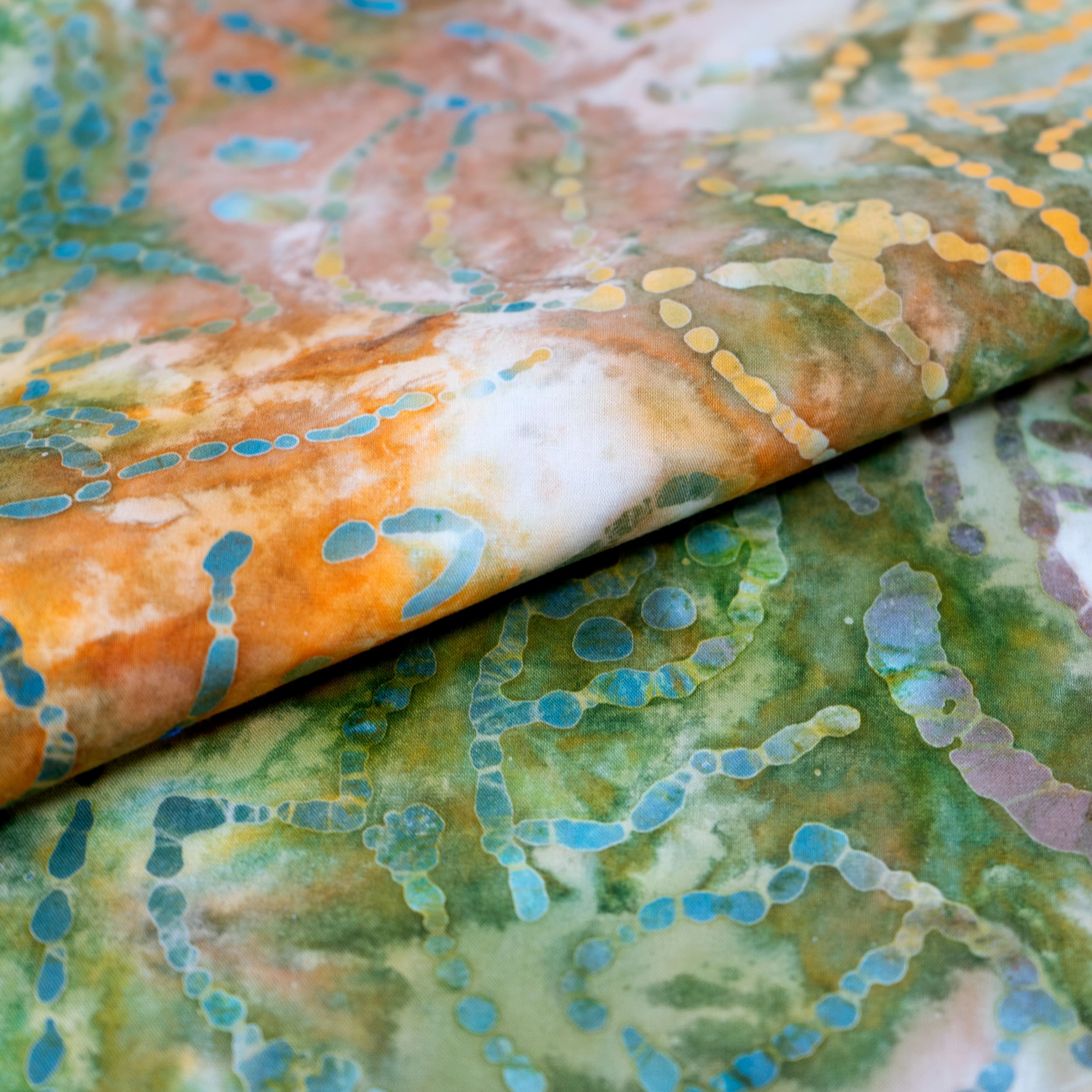 SINGER Batik Green &#x26; Orange Leaves Cotton Fabric