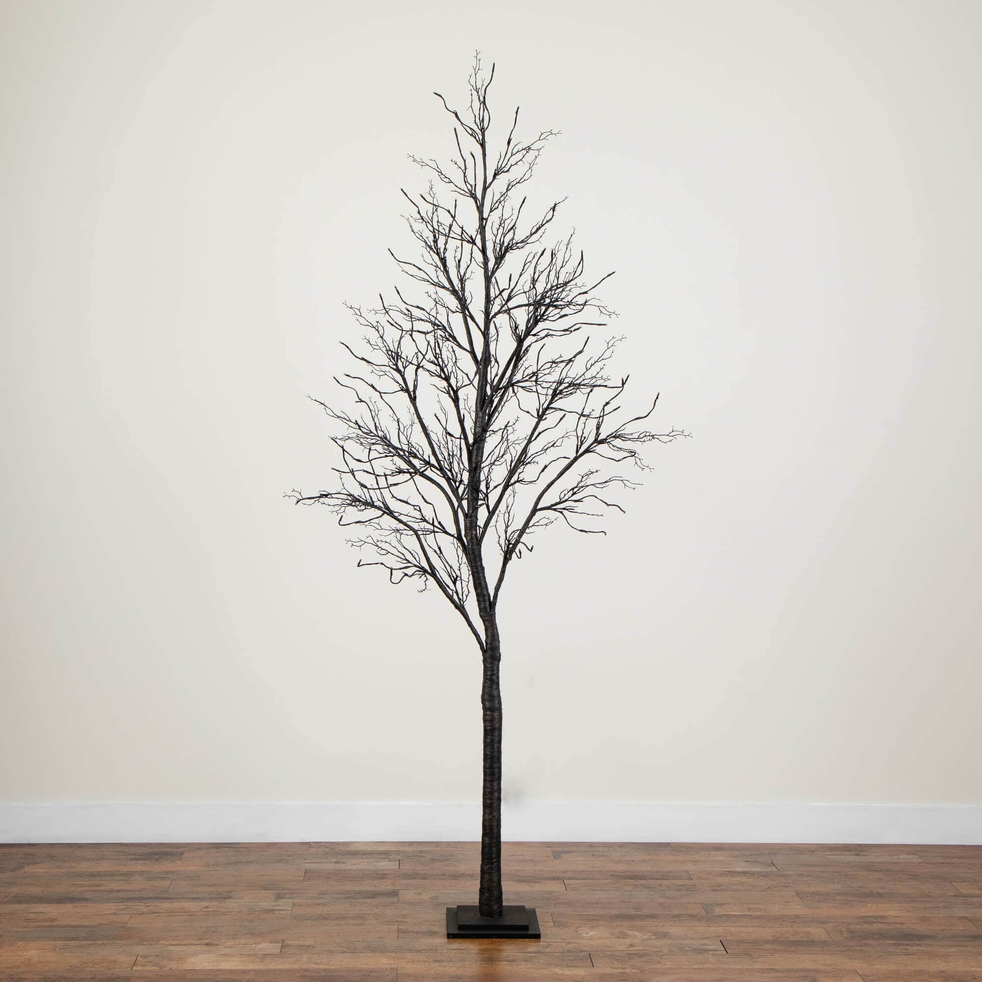 8ft. Pre-Lit Halloween Deluxe Black Twig Artificial Tree with 216 Orange & Purple LED Lights