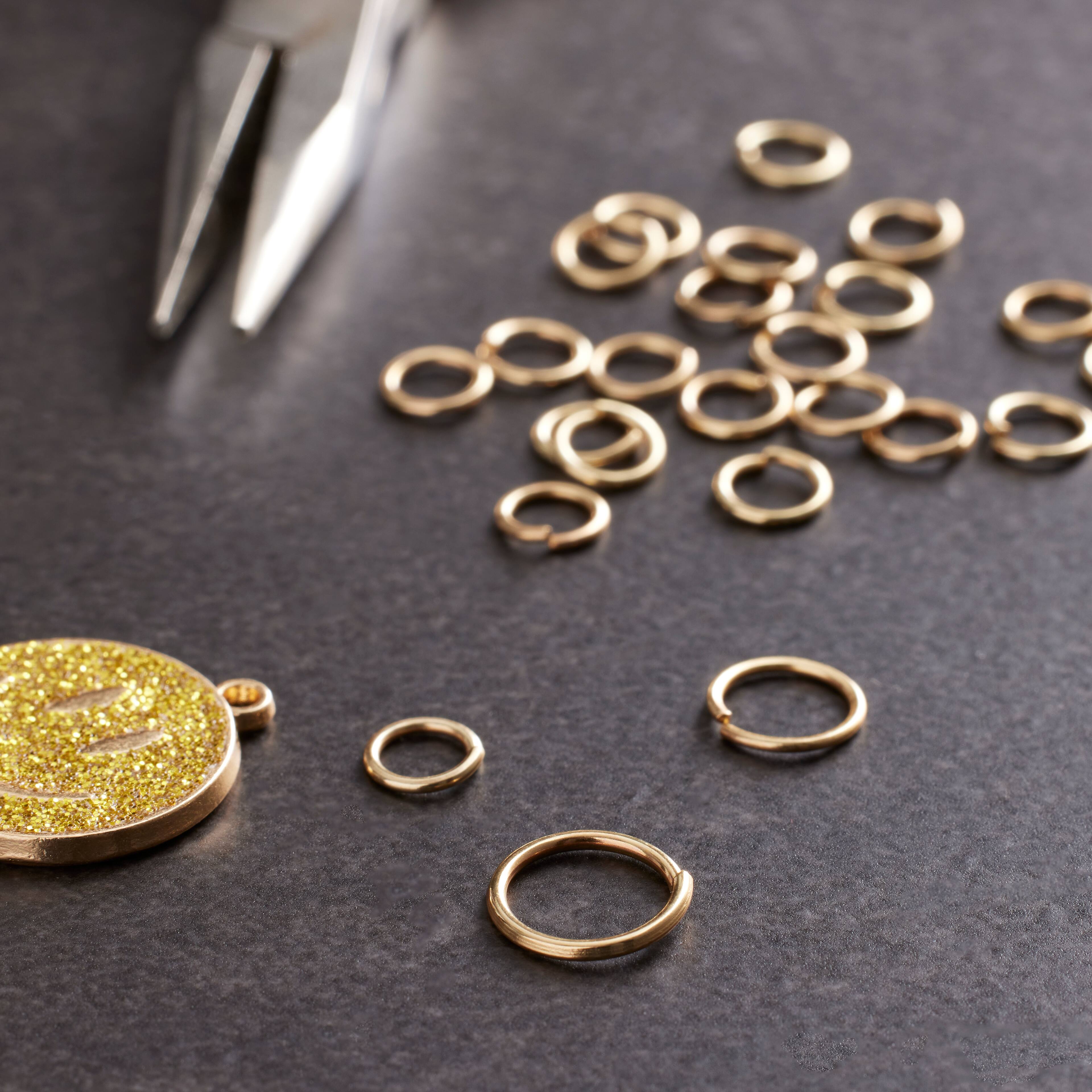 12 Packs: 200 ct. (2,400 total) Gold Jump Rings by Creatology™