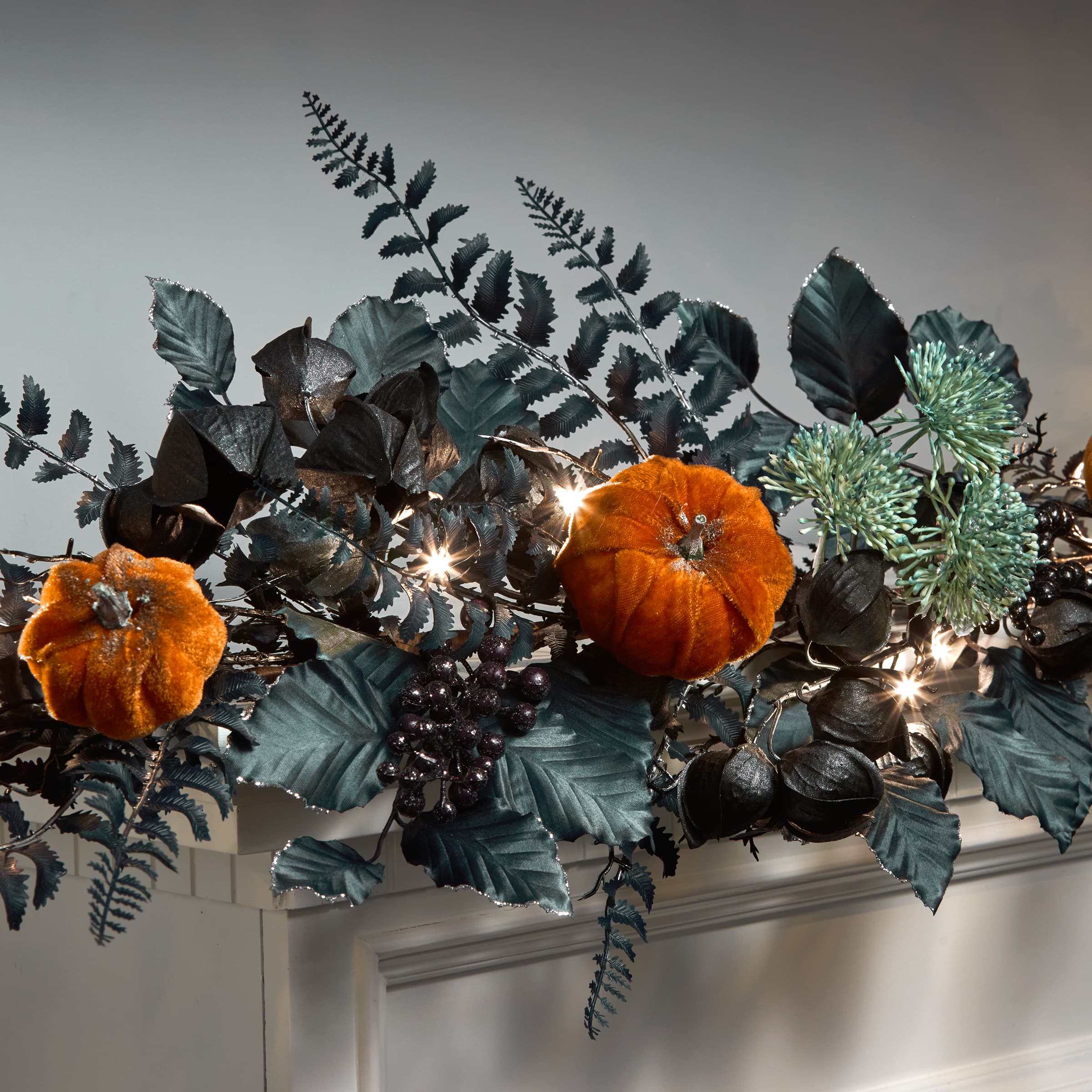 6ft. Black &#x26; Orange Halloween Pumpkin Pre-Lit LED Garland