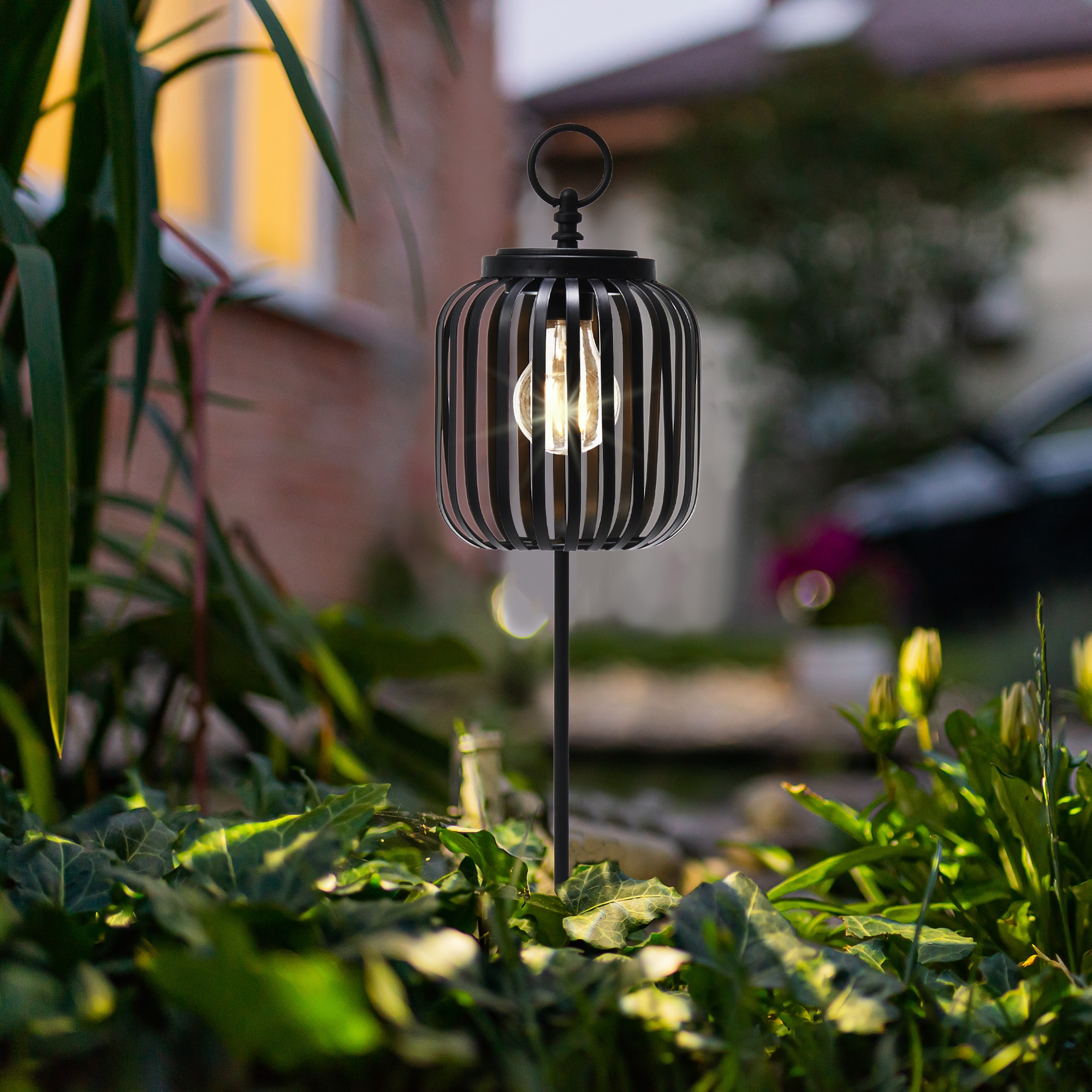 Glitzhome&#xAE; 33&#x22; Black Metal Stripes Solar Powered Outdoor Lantern