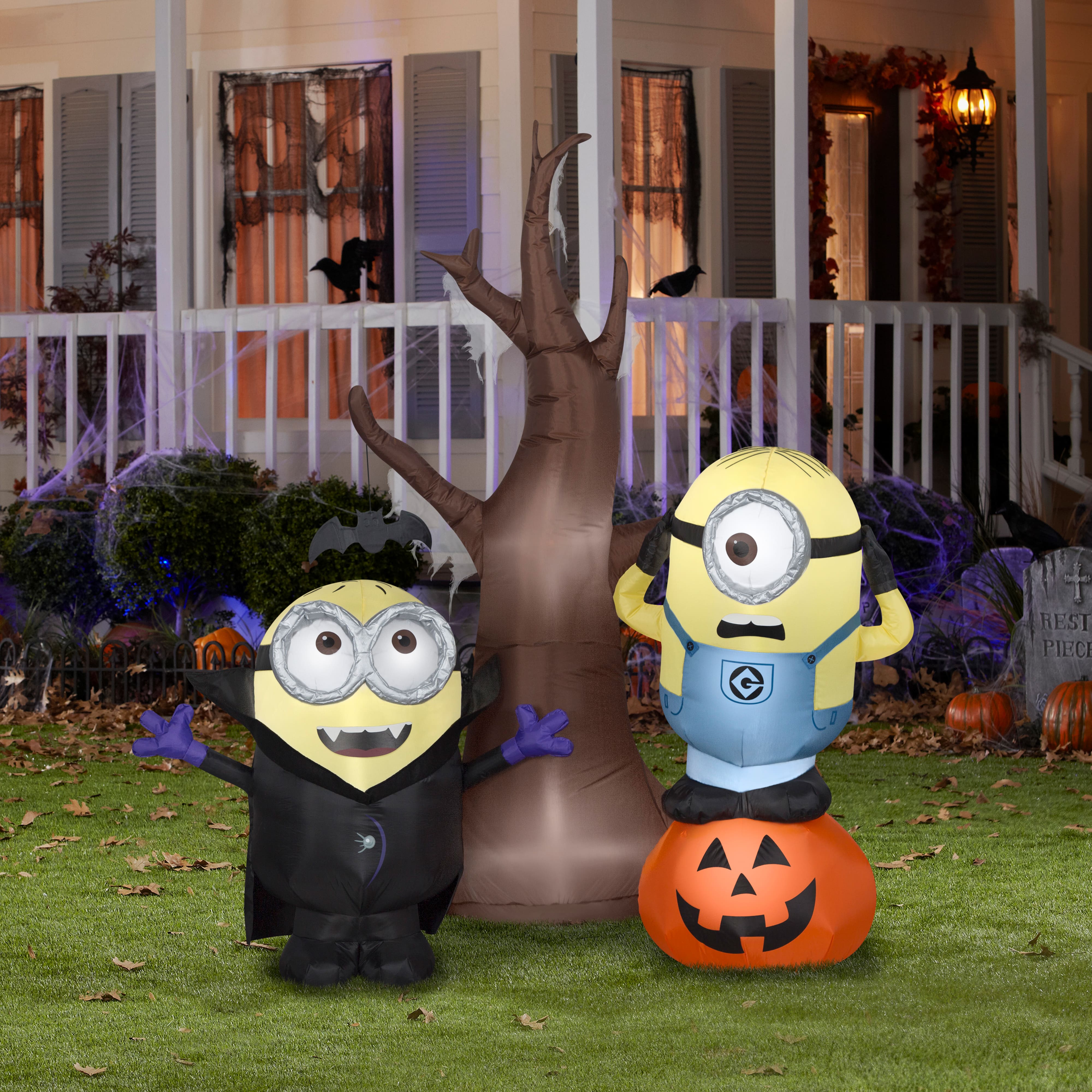 5.5ft. Airblown® Inflatable Minions with Tree and Pumpkin