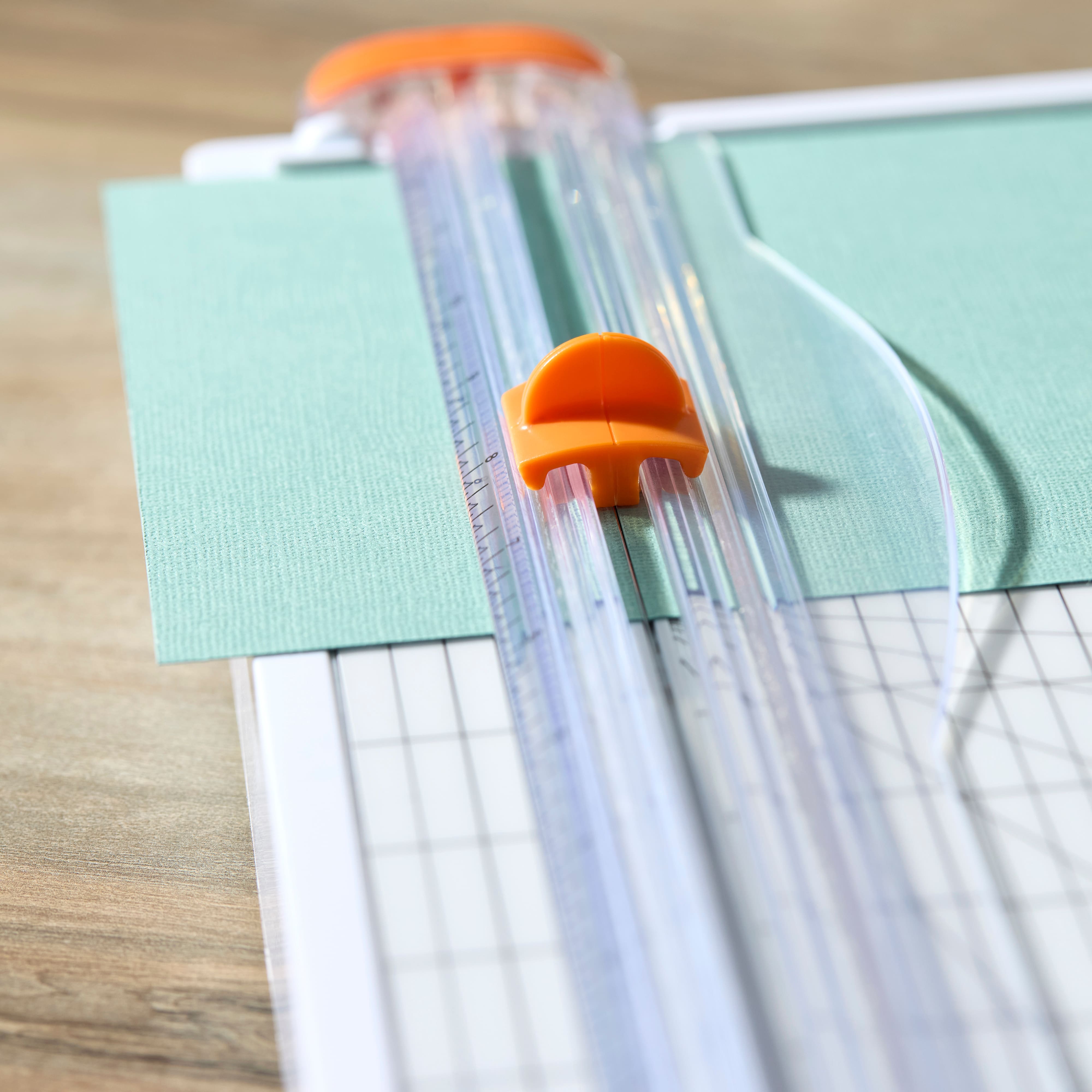 Fiskars® SureCut™ Deluxe Trimmer with Built-In Storage